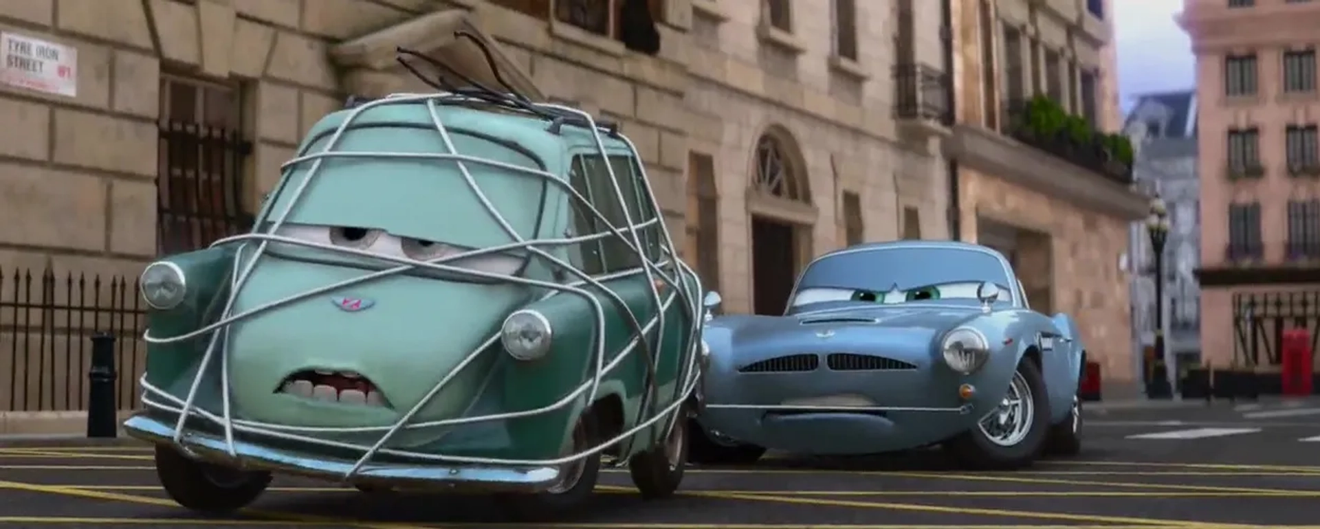 Michael Caine and Thomas Kretschmann in Cars 2 (2011)