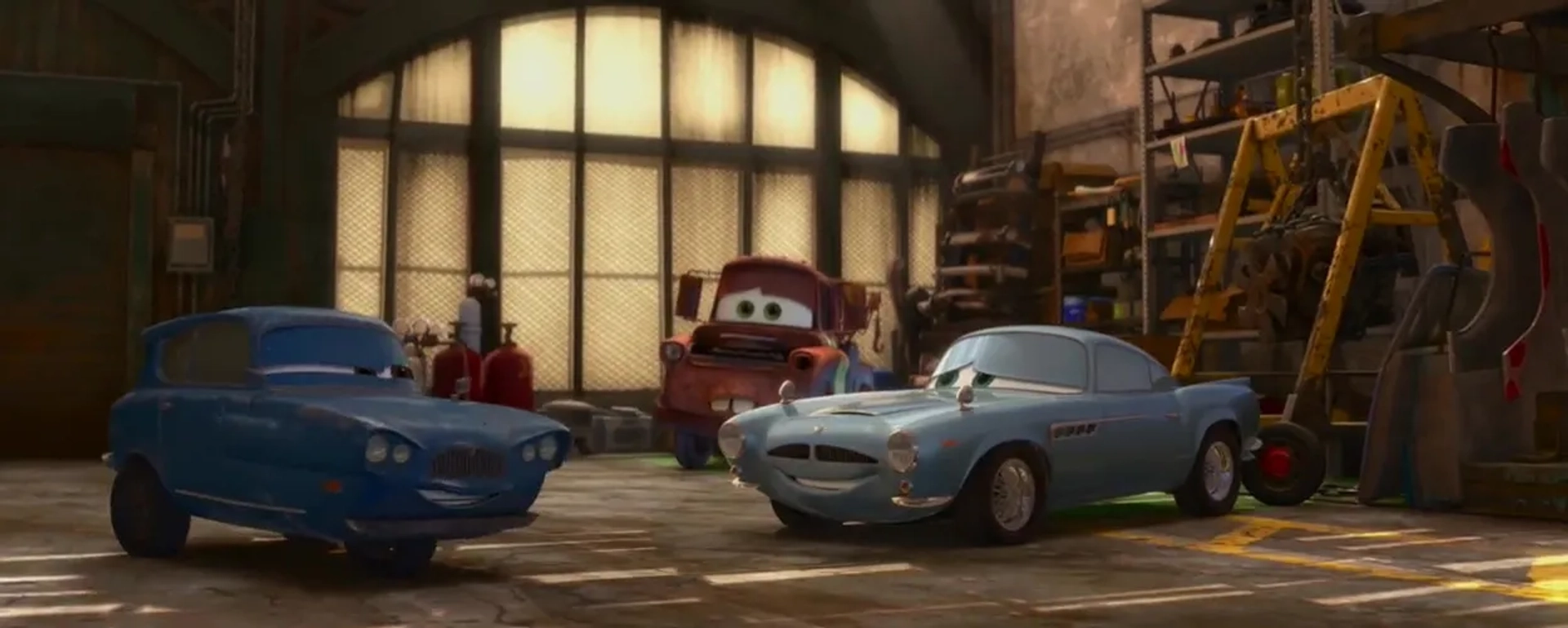 Michael Caine, Larry the Cable Guy, and Michel Michelis in Cars 2 (2011)