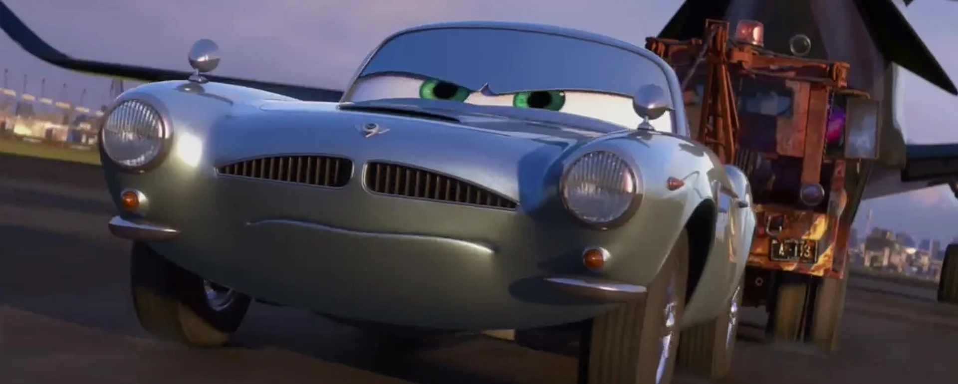 Michael Caine, Jason Isaacs, and Larry the Cable Guy in Cars 2 (2011)