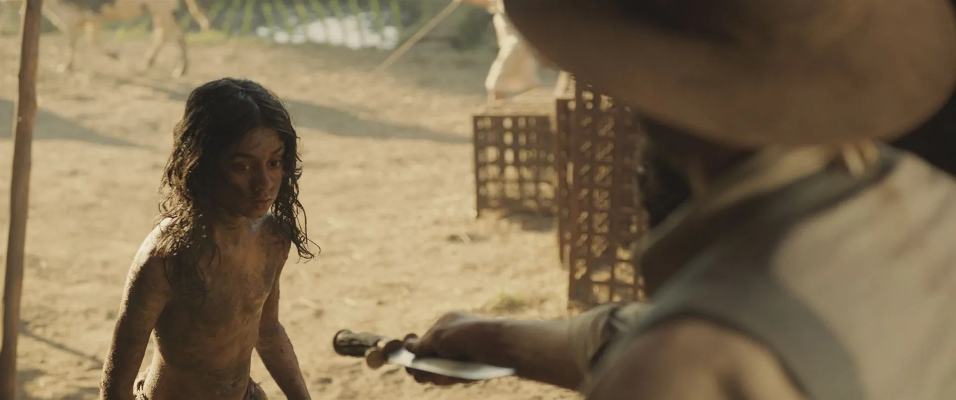 Matthew Rhys and Rohan Chand in Mowgli: Legend of the Jungle (2018)