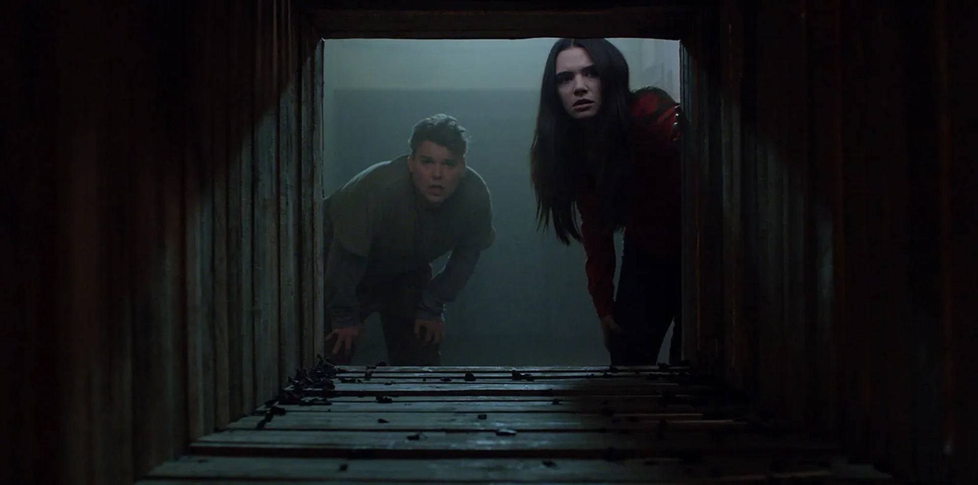 Andrew Lewis Caldwell and Katie Stevens in Haunt (2019)