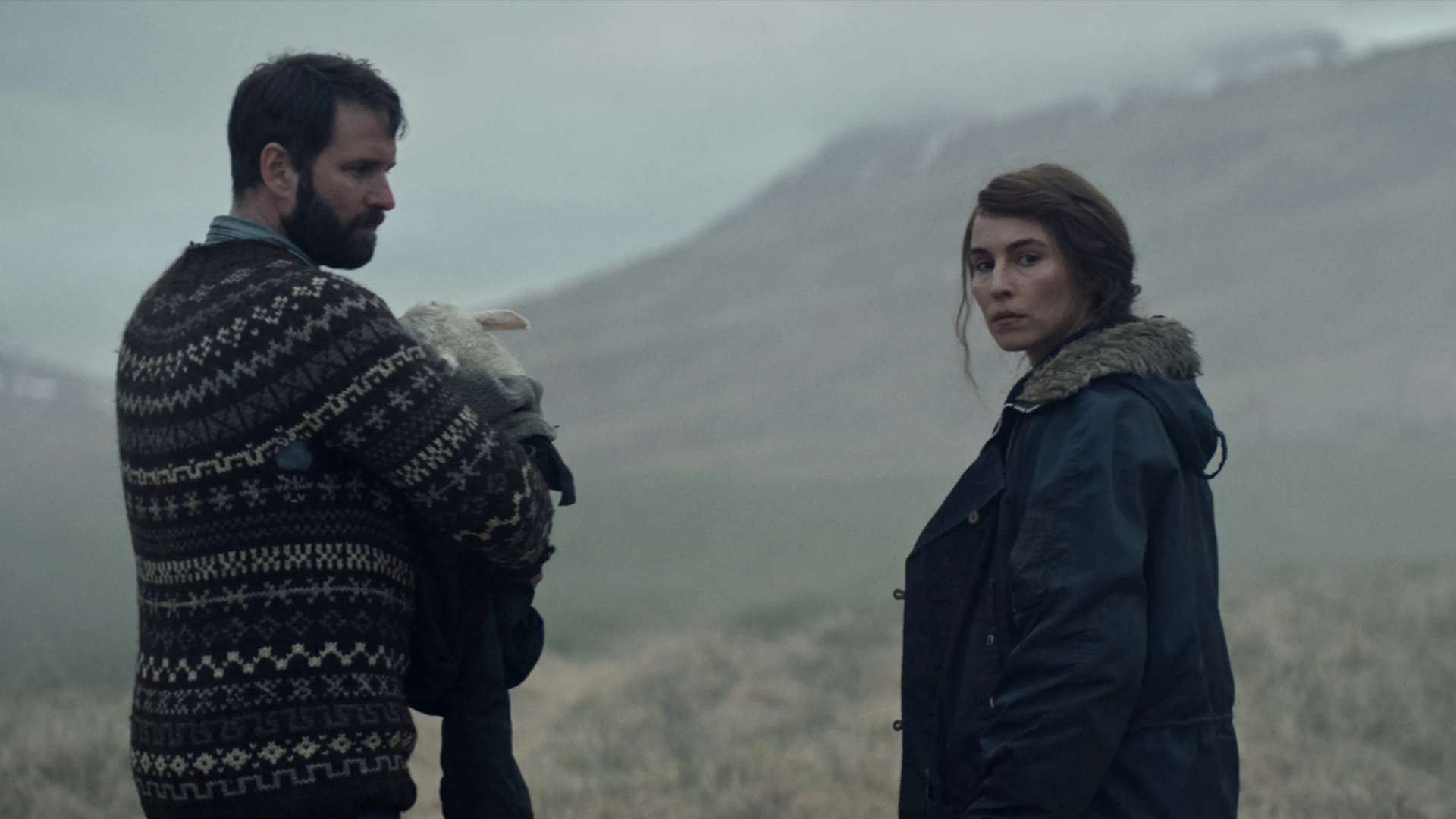 Hilmir Snær Guðnason and Noomi Rapace in Lamb (2021)