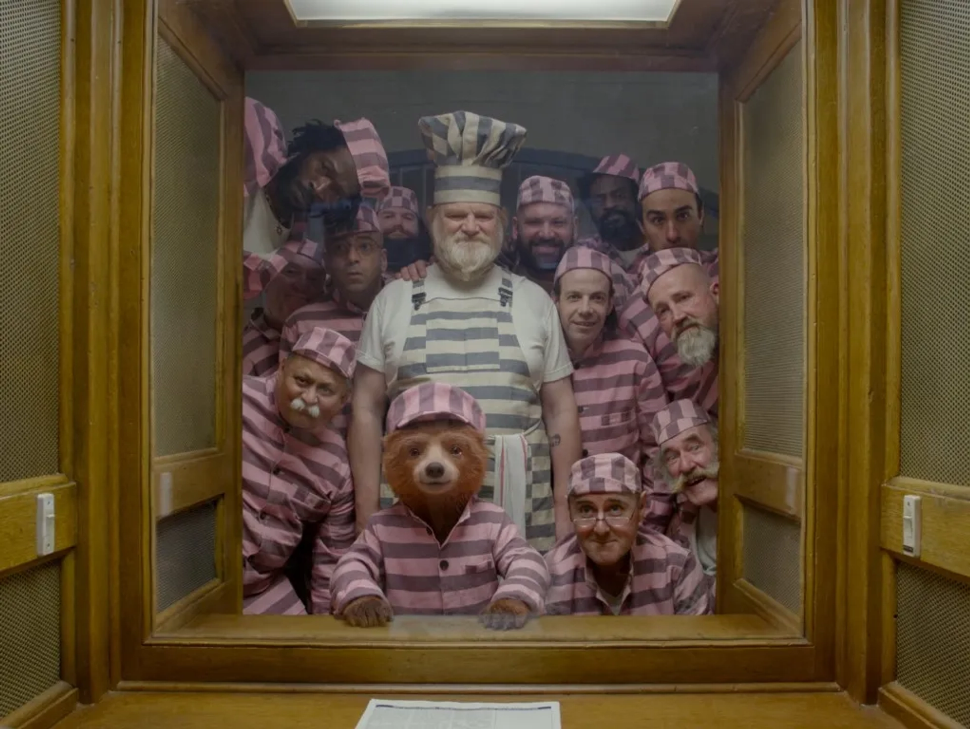 Brendan Gleeson, Nicholas Lumley, Cal McCrystal, Noah Taylor, Ben Whishaw, Aaron Neil, Robert Stevenson, Virgile Elana, Tom Davis, Stephen McDade, Emeson Nwolie, Jamie Demetriou, Deepak Anand, and Geoff Banks in Paddington 2 (2017)