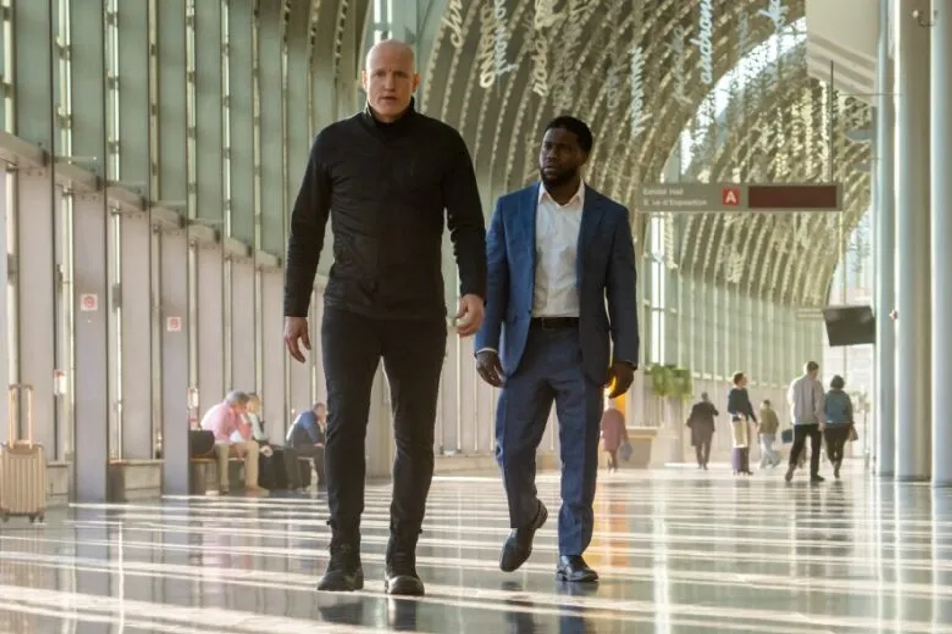 Woody Harrelson and Kevin Hart in The Man from Toronto (2022)