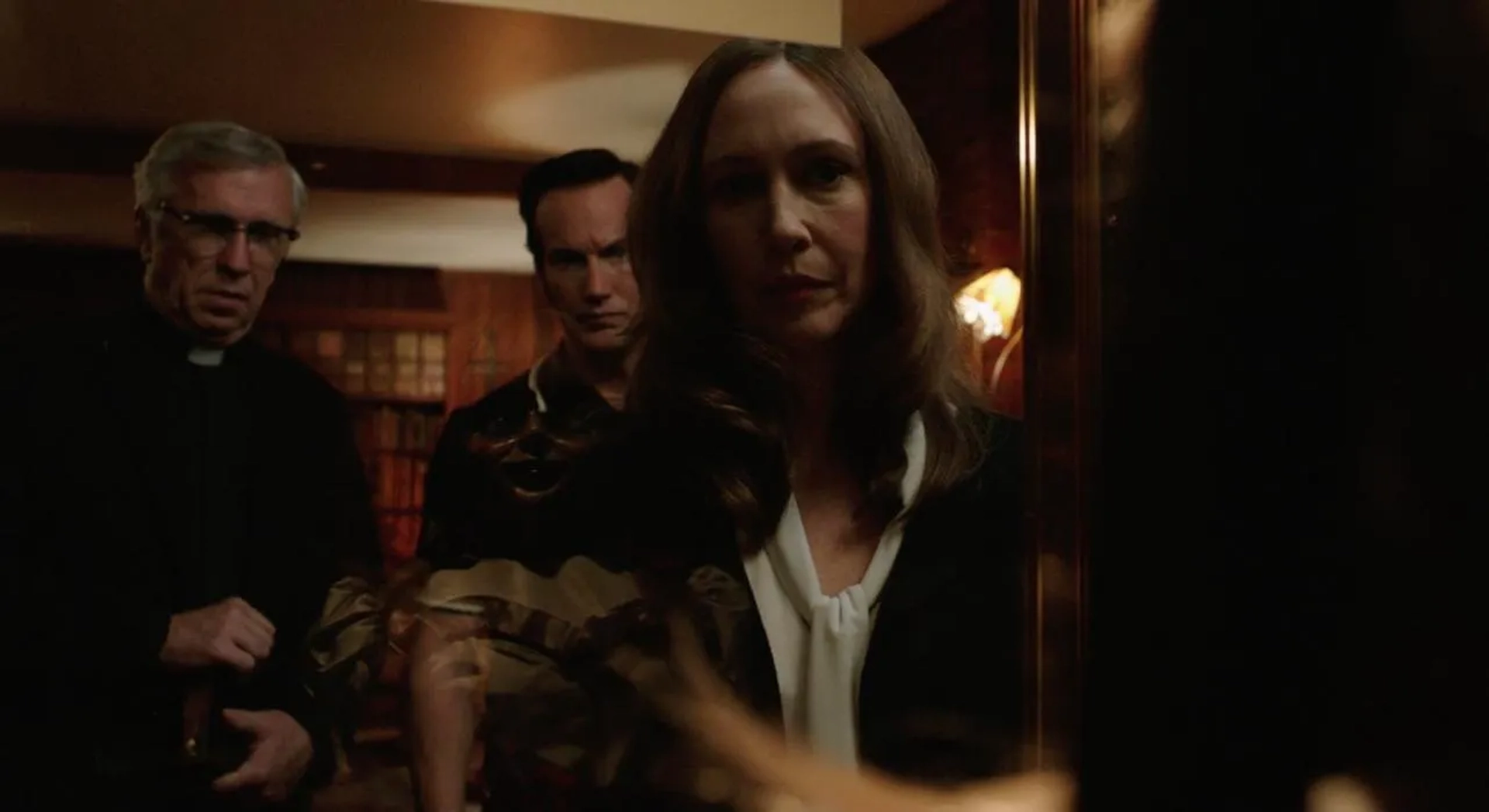 Steve Coulter, Vera Farmiga, and Patrick Wilson in Annabelle Comes Home (2019)