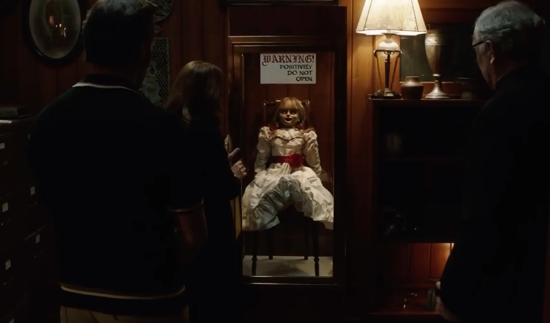 Steve Coulter, Vera Farmiga, and Patrick Wilson in Annabelle Comes Home (2019)