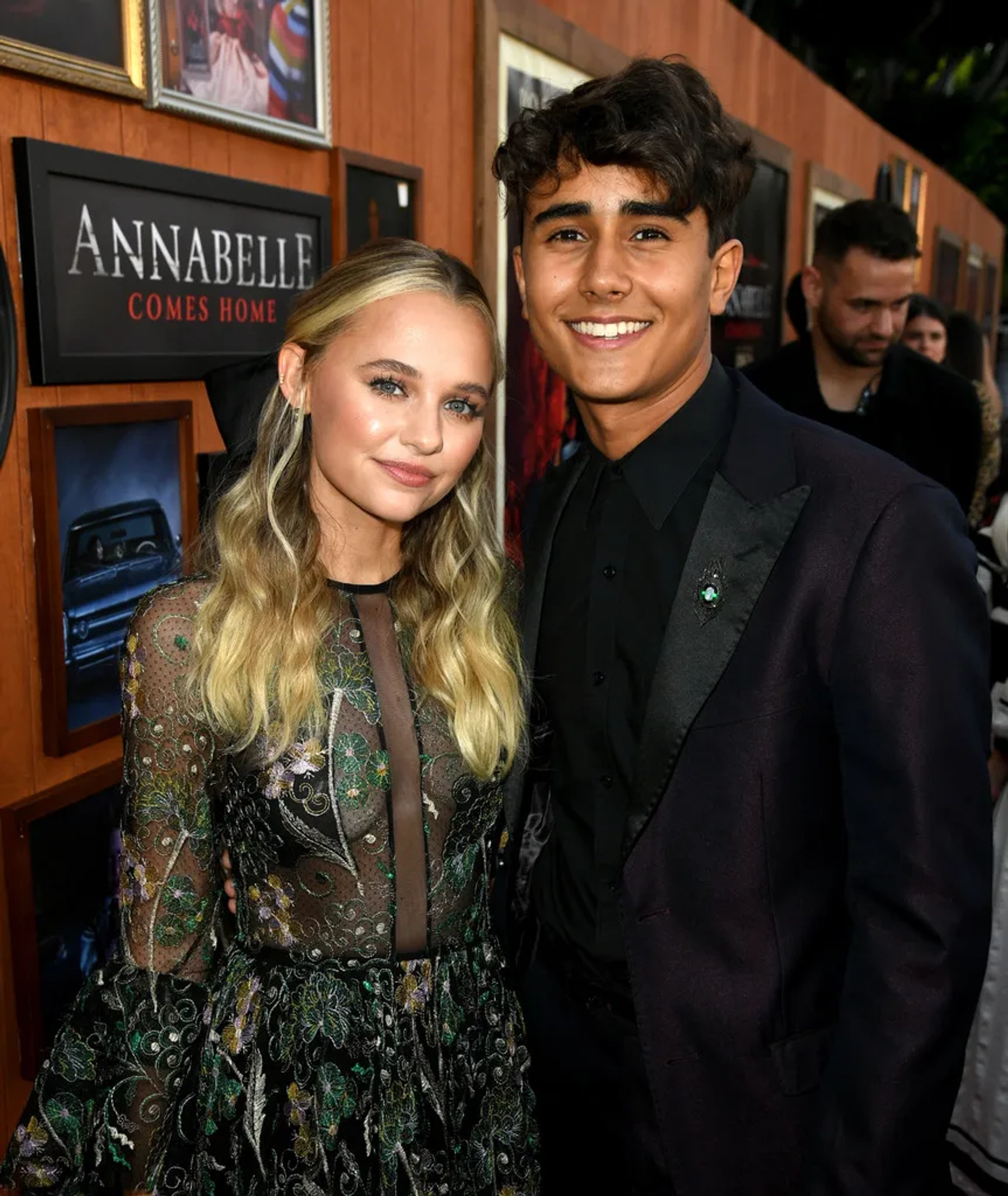 Madison Iseman and Michael Cimino at an event for Annabelle Comes Home (2019)