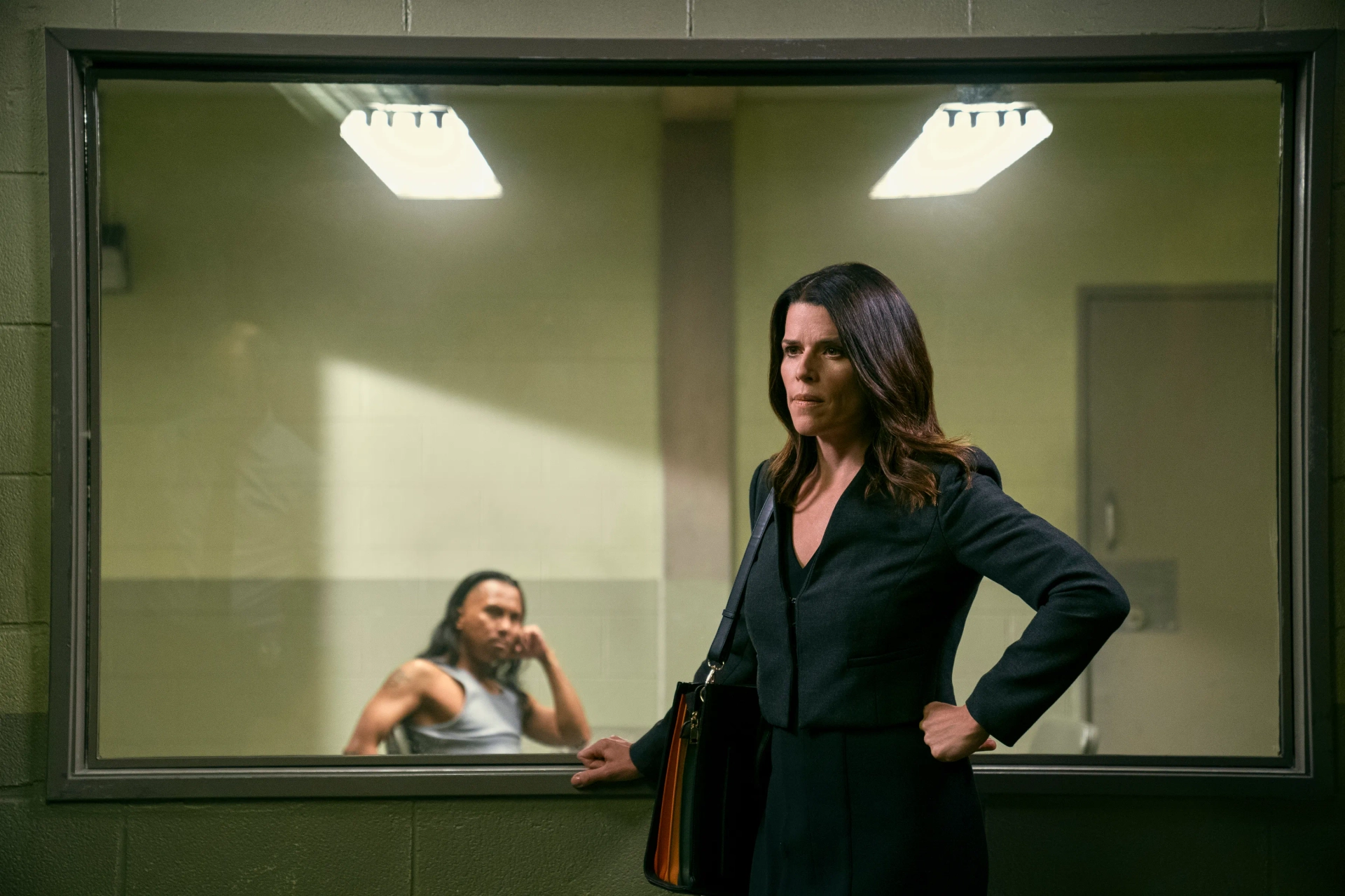 Neve Campbell and Jeff Francisco in The Lincoln Lawyer (2022)