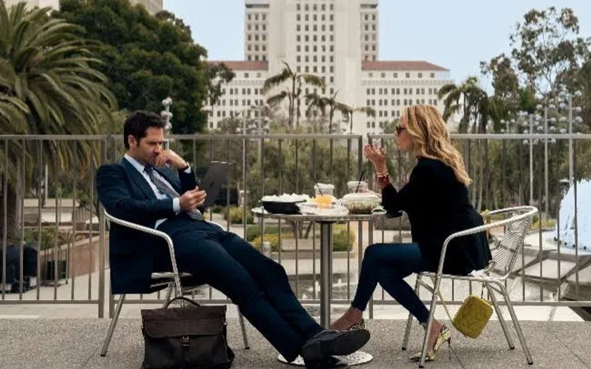 Becki Newton and Manuel Garcia-Rulfo in The Lincoln Lawyer (2022)