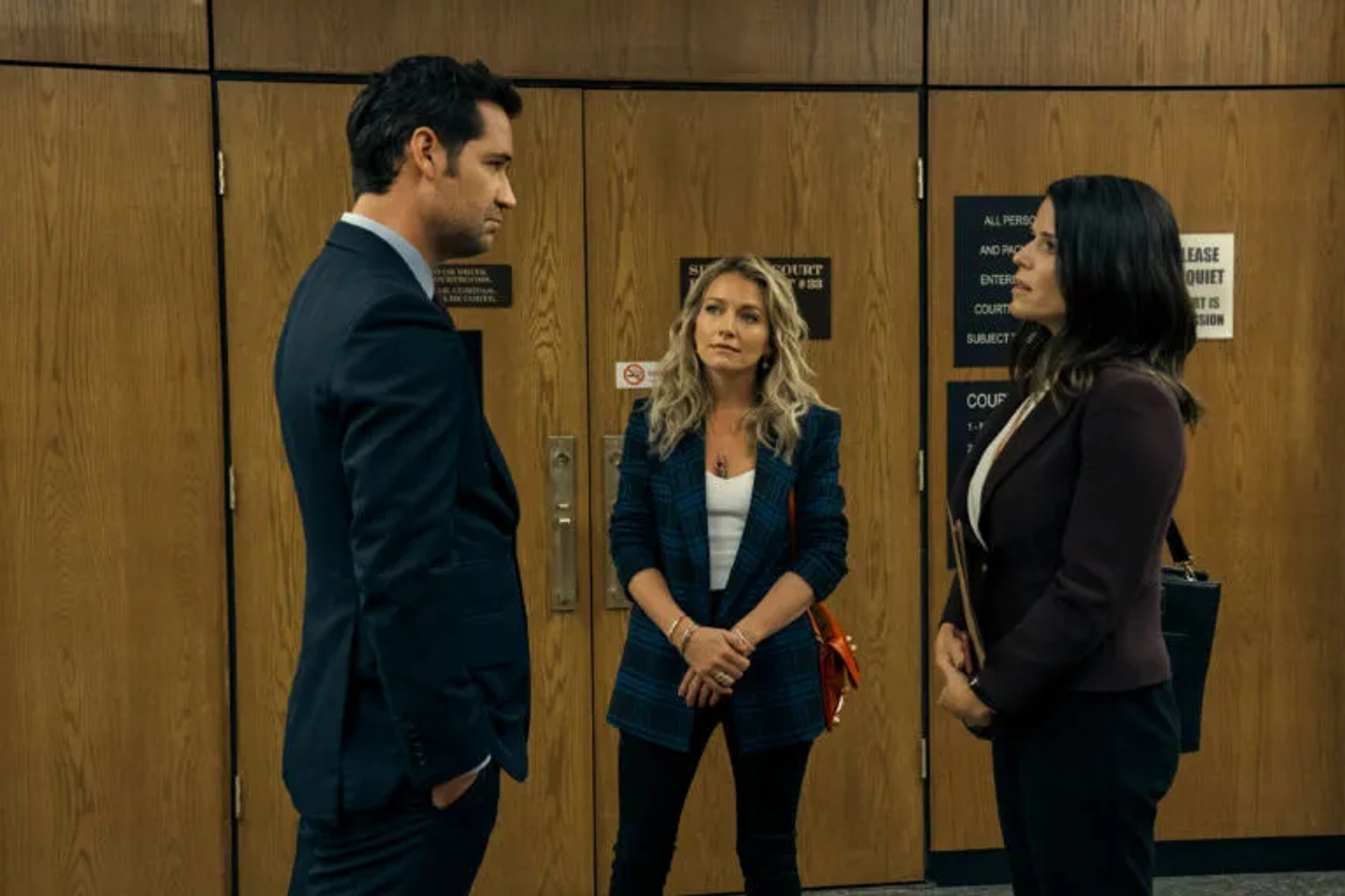 Neve Campbell, Becki Newton, and Manuel Garcia-Rulfo in The Lincoln Lawyer (2022)