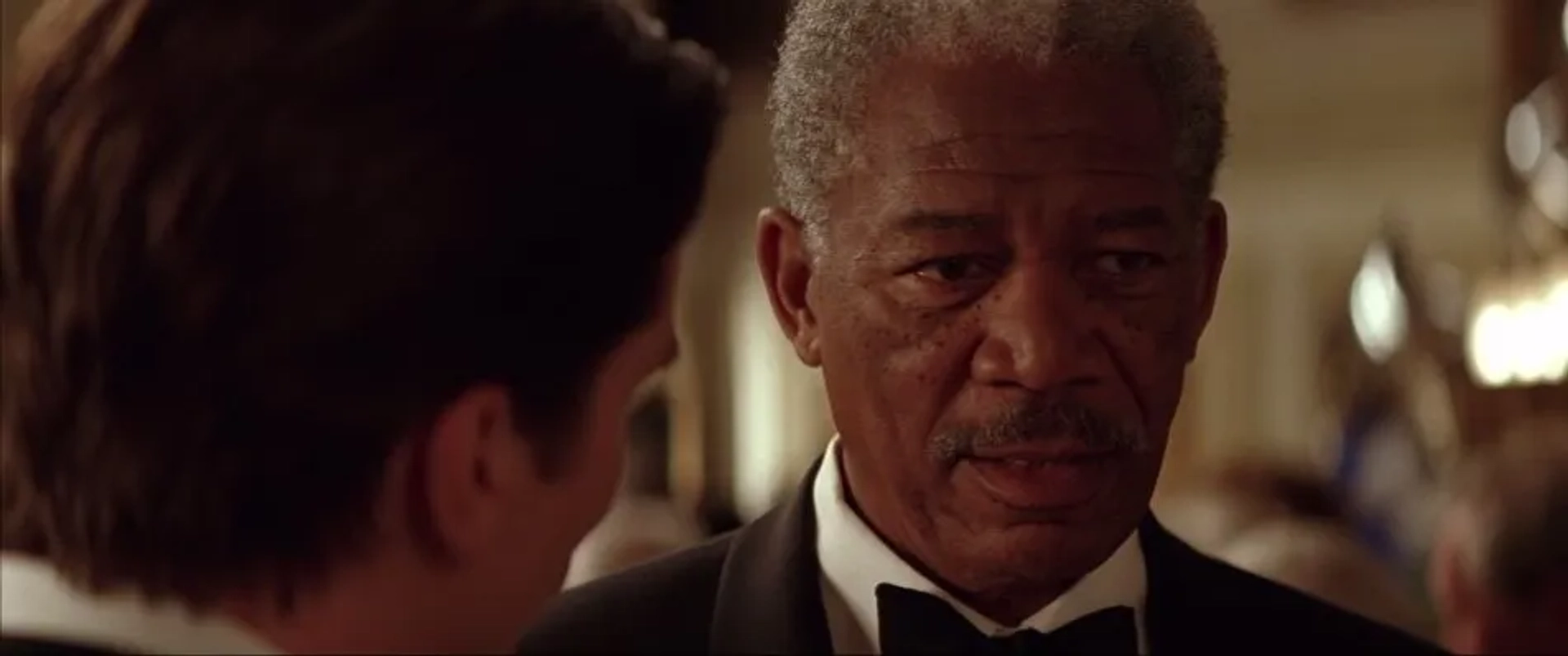 Morgan Freeman and Christian Bale in Batman Begins (2005)