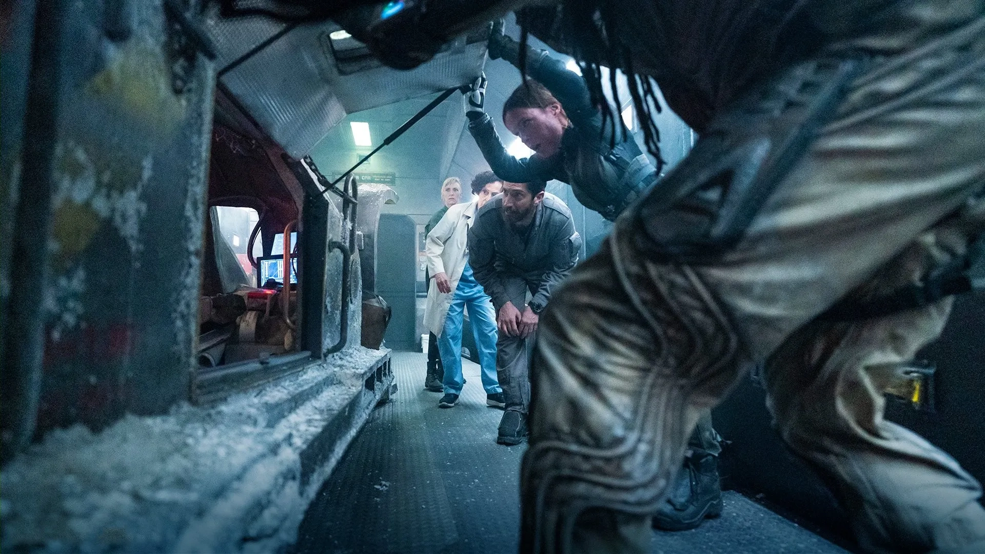 Iddo Goldberg, Karin Konoval, Katie McGuinness, and Mickey Sumner in Snowpiercer: A Beacon for Us All (2022)