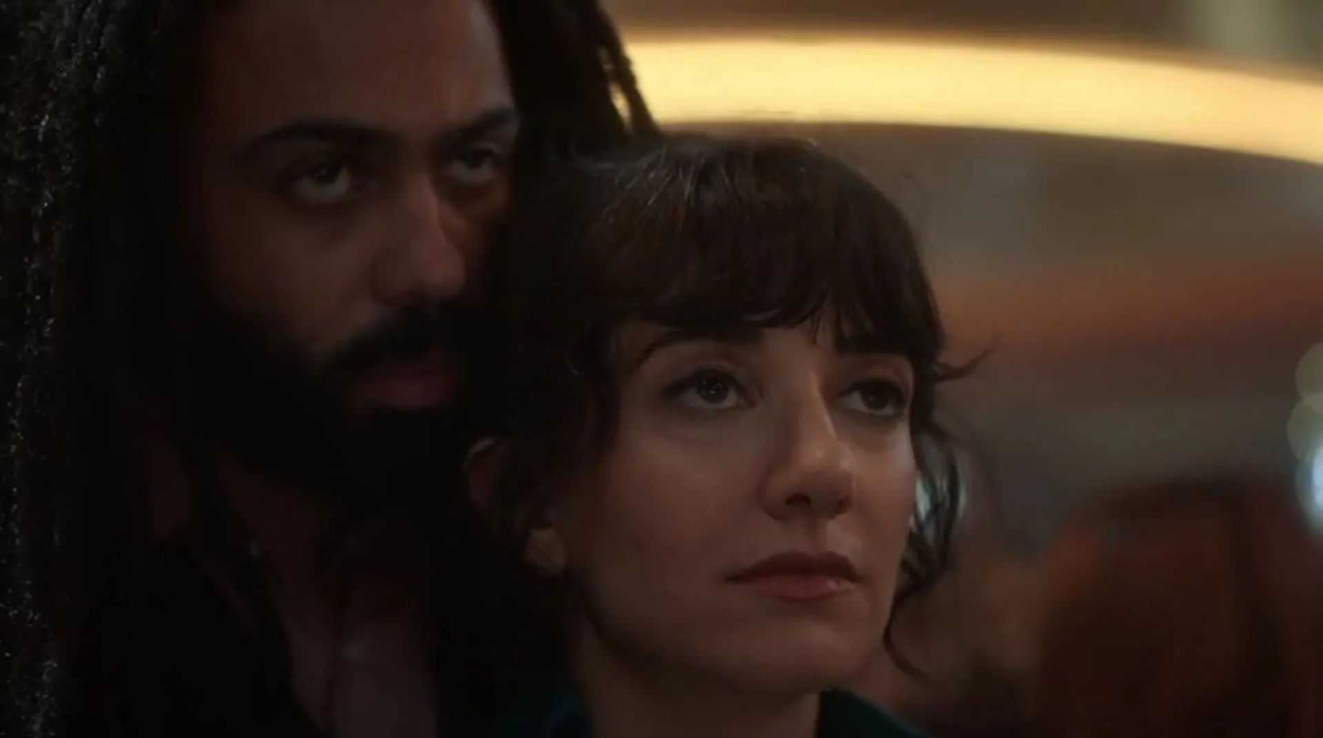 Sheila Vand and Daveed Diggs in Snowpiercer: A Single Trade (2021)