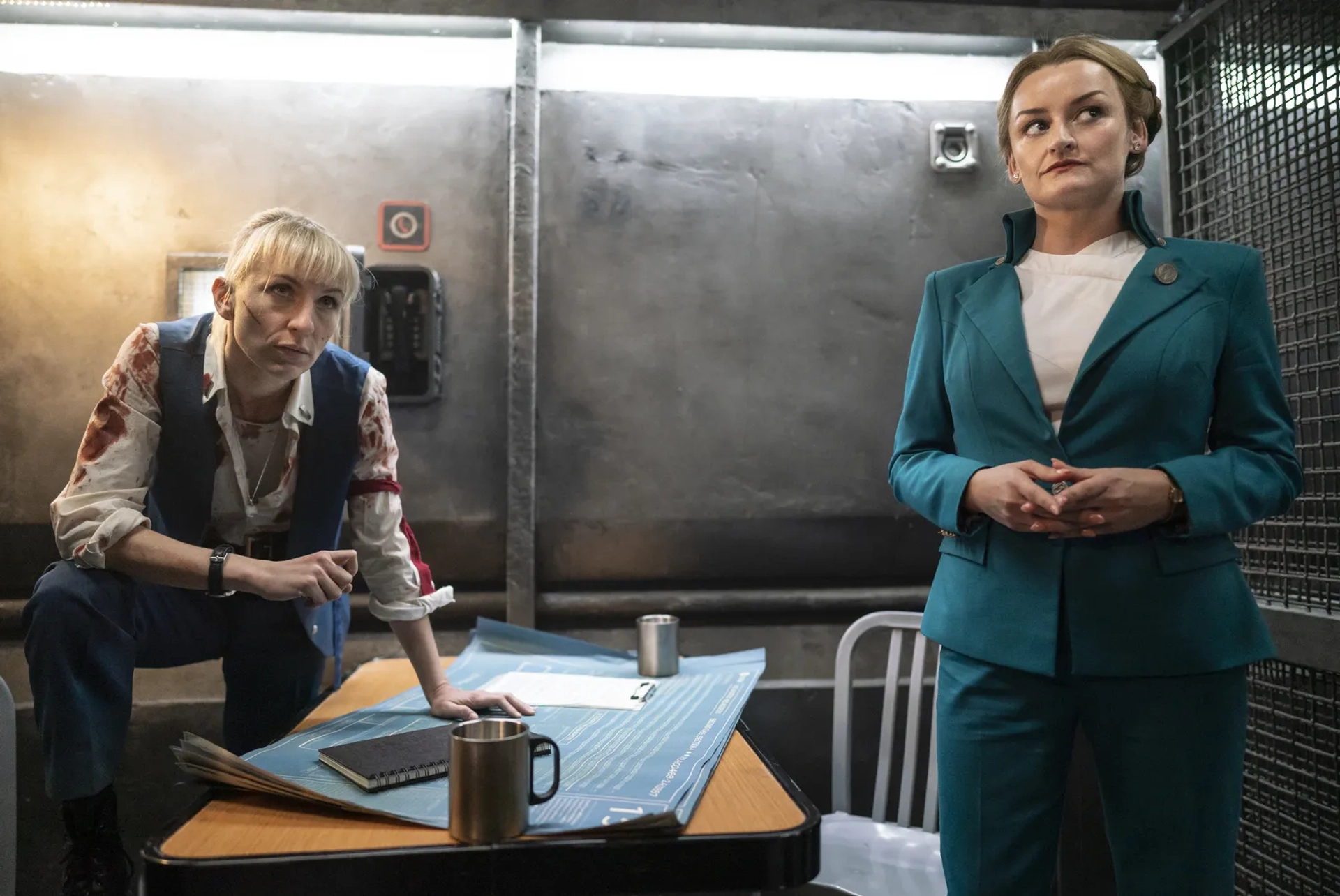 Alison Wright and Mickey Sumner in Snowpiercer: The Time of Two Engines (2021)