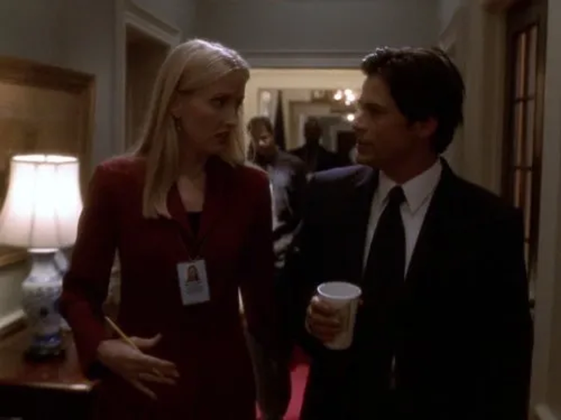 Rob Lowe and Janel Moloney in The West Wing (1999)