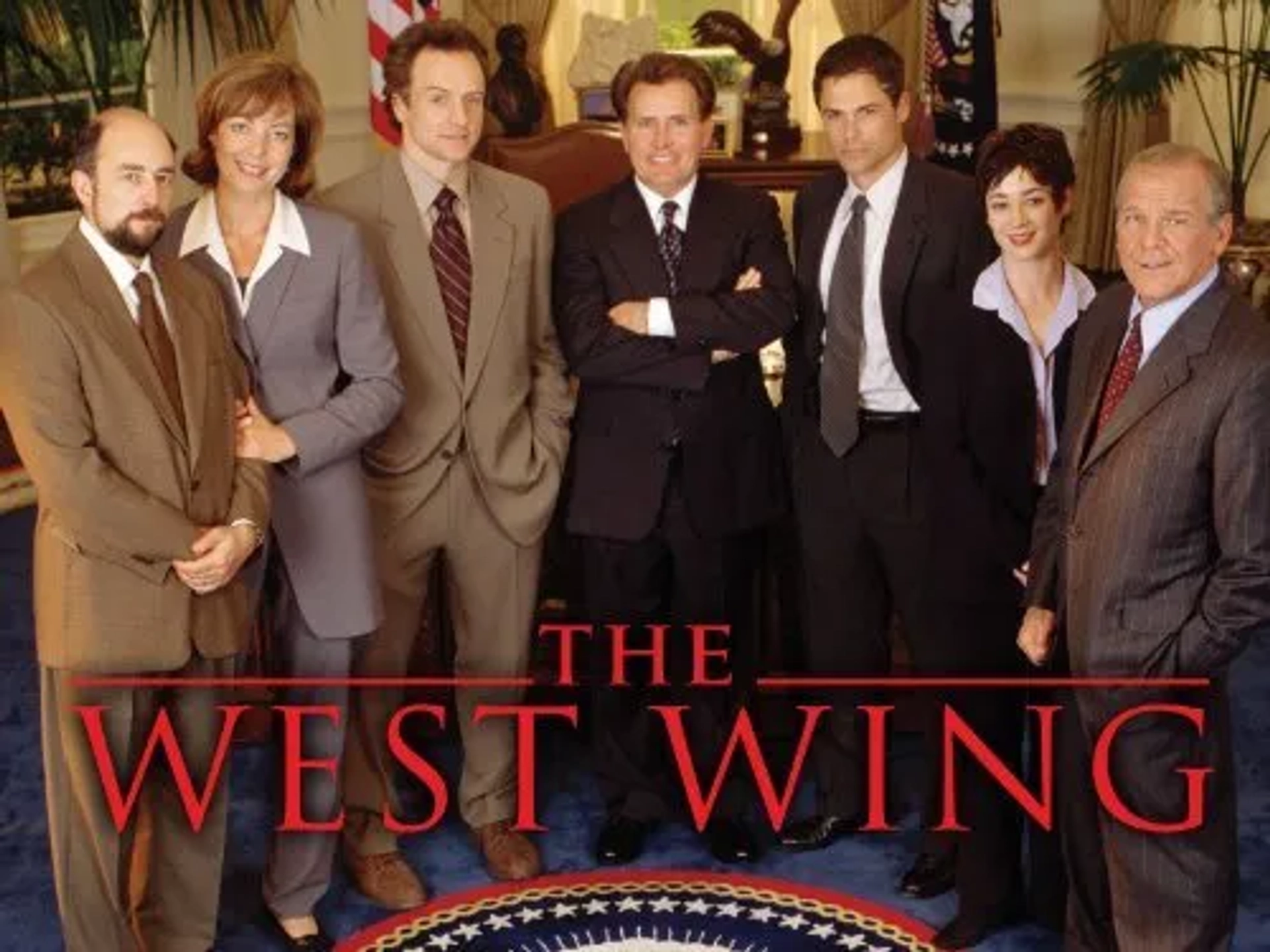 Rob Lowe, Martin Sheen, Allison Janney, Moira Kelly, Richard Schiff, John Spencer, and Bradley Whitford in The West Wing (1999)