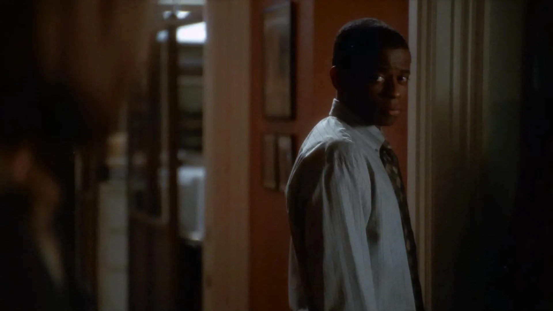 Allison Janney and Dulé Hill in The West Wing (1999)