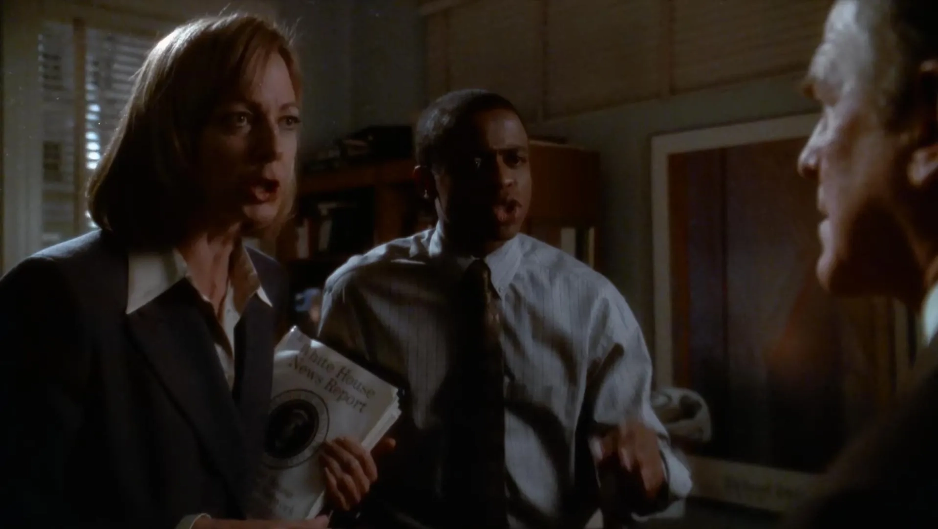 Allison Janney, Dulé Hill, and John Spencer in The West Wing (1999)