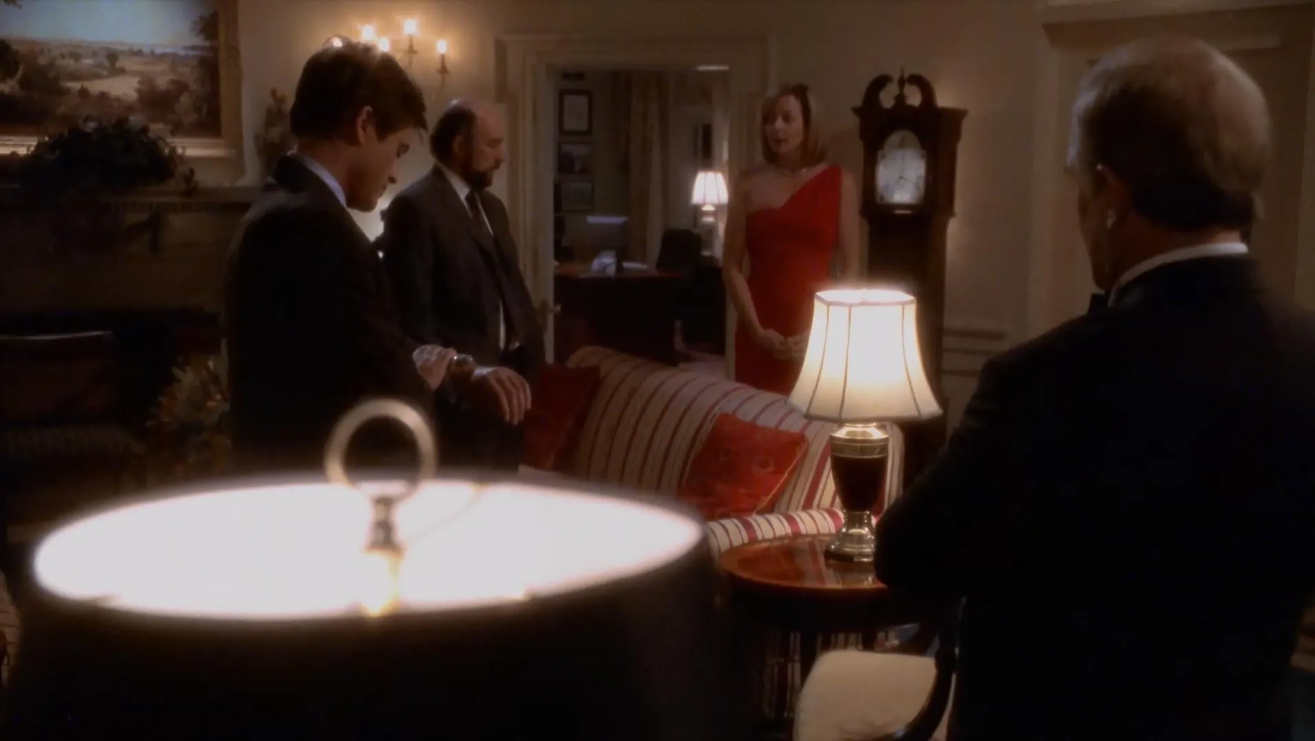 Rob Lowe, Allison Janney, Richard Schiff, and John Spencer in The West Wing (1999)