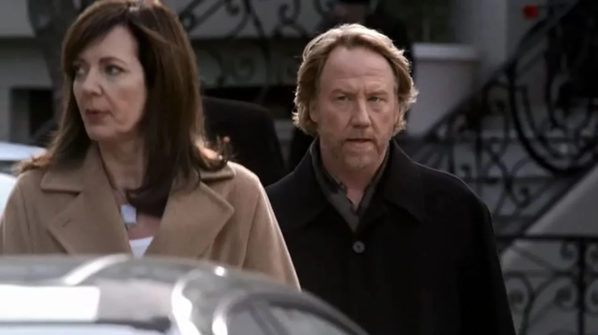 Allison Janney and Timothy Busfield in The West Wing (1999)