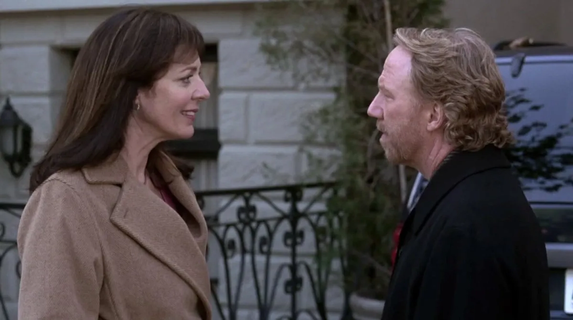 Allison Janney and Timothy Busfield in The West Wing (1999)