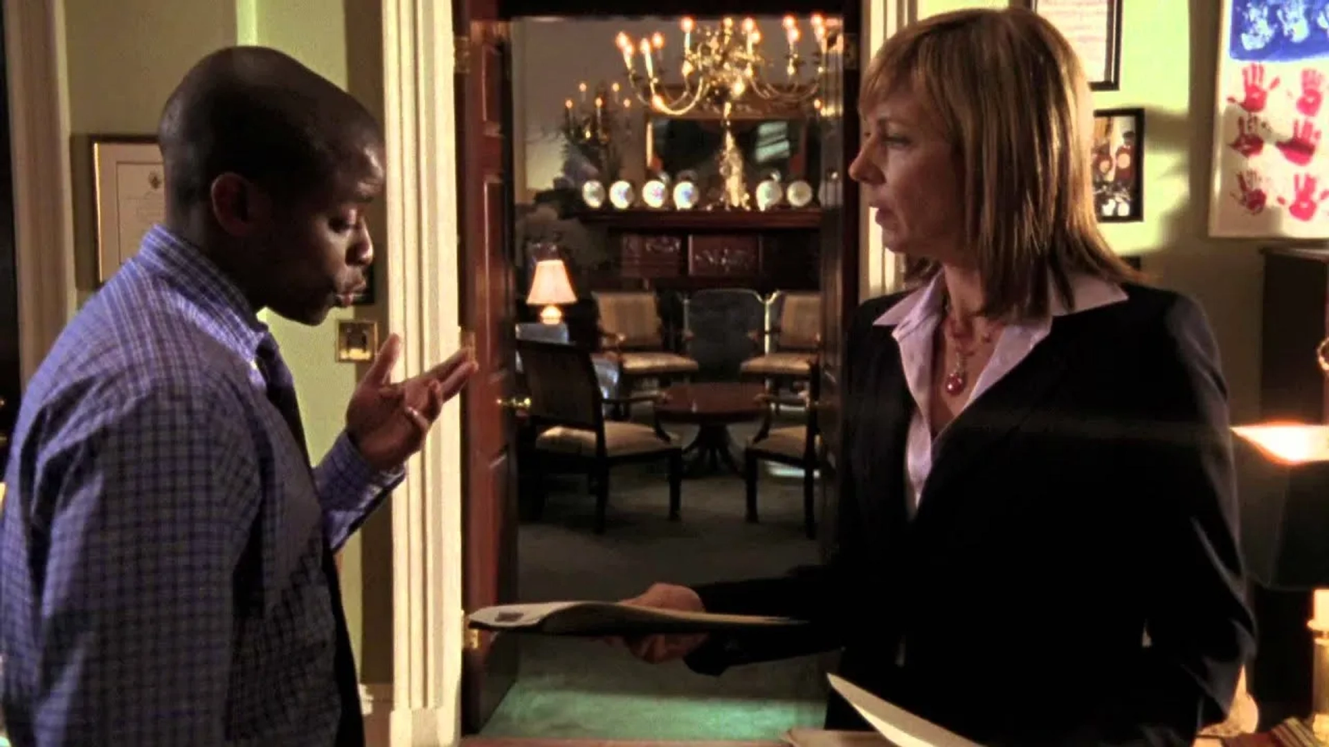 Allison Janney and Dulé Hill in The West Wing (1999)