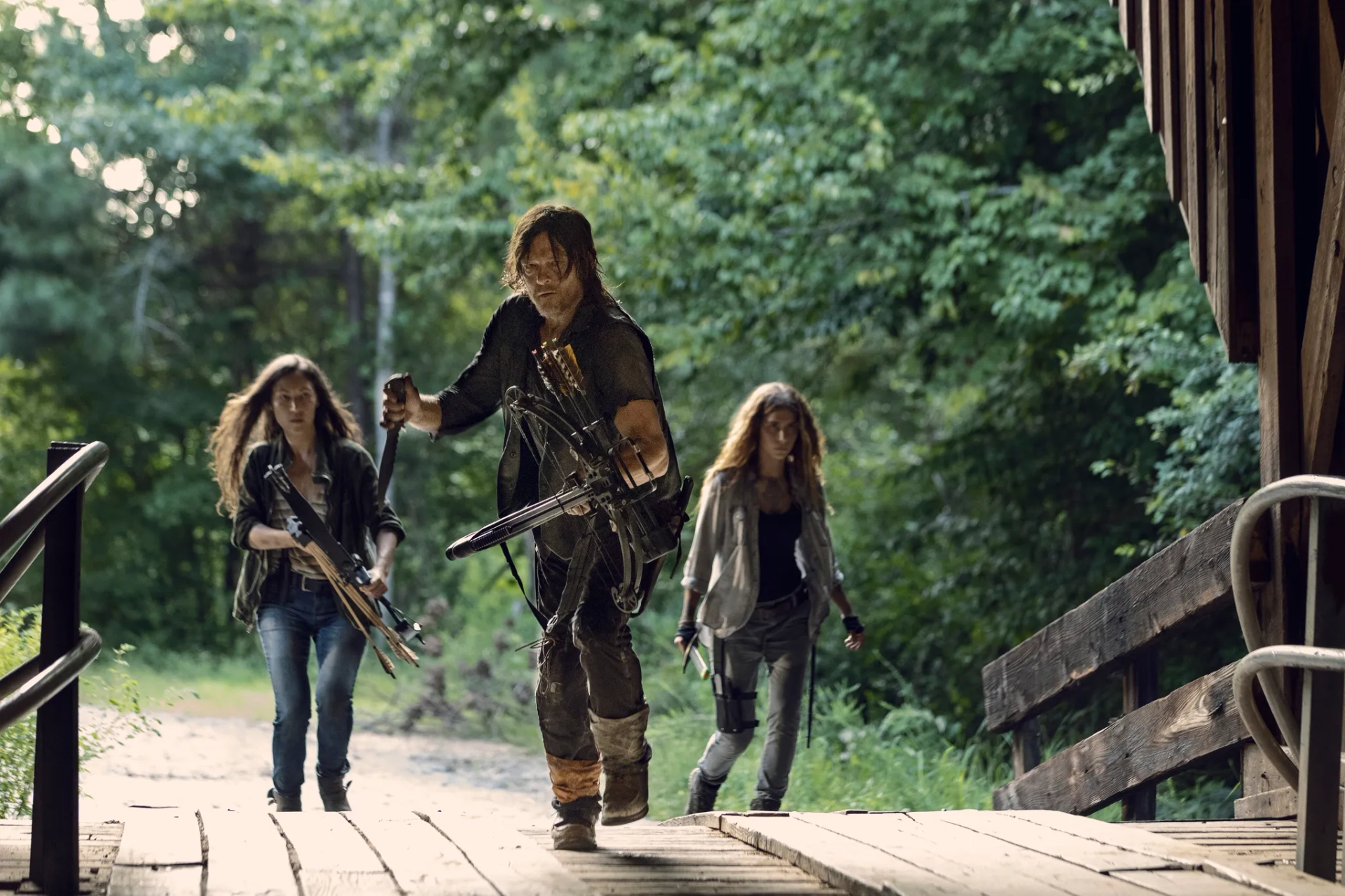 Norman Reedus, Eleanor Matsuura, and Nadia Hilker in The Walking Dead (2010)
