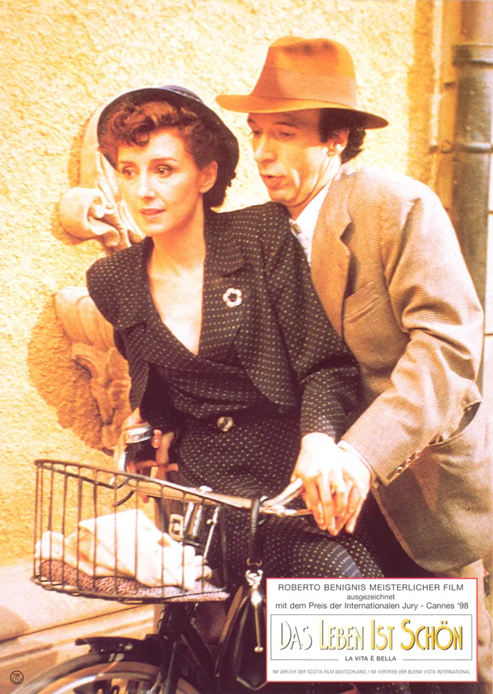 Roberto Benigni and Nicoletta Braschi in Life Is Beautiful (1997)