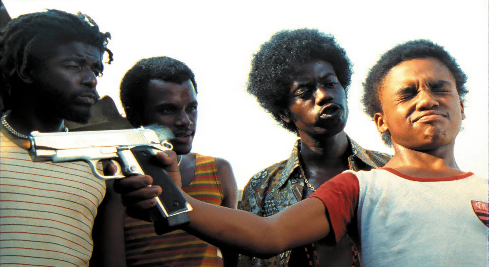 Leandro Firmino, Darlan Cunha, and Paulo 'Jacaré' César in City of God (2002)