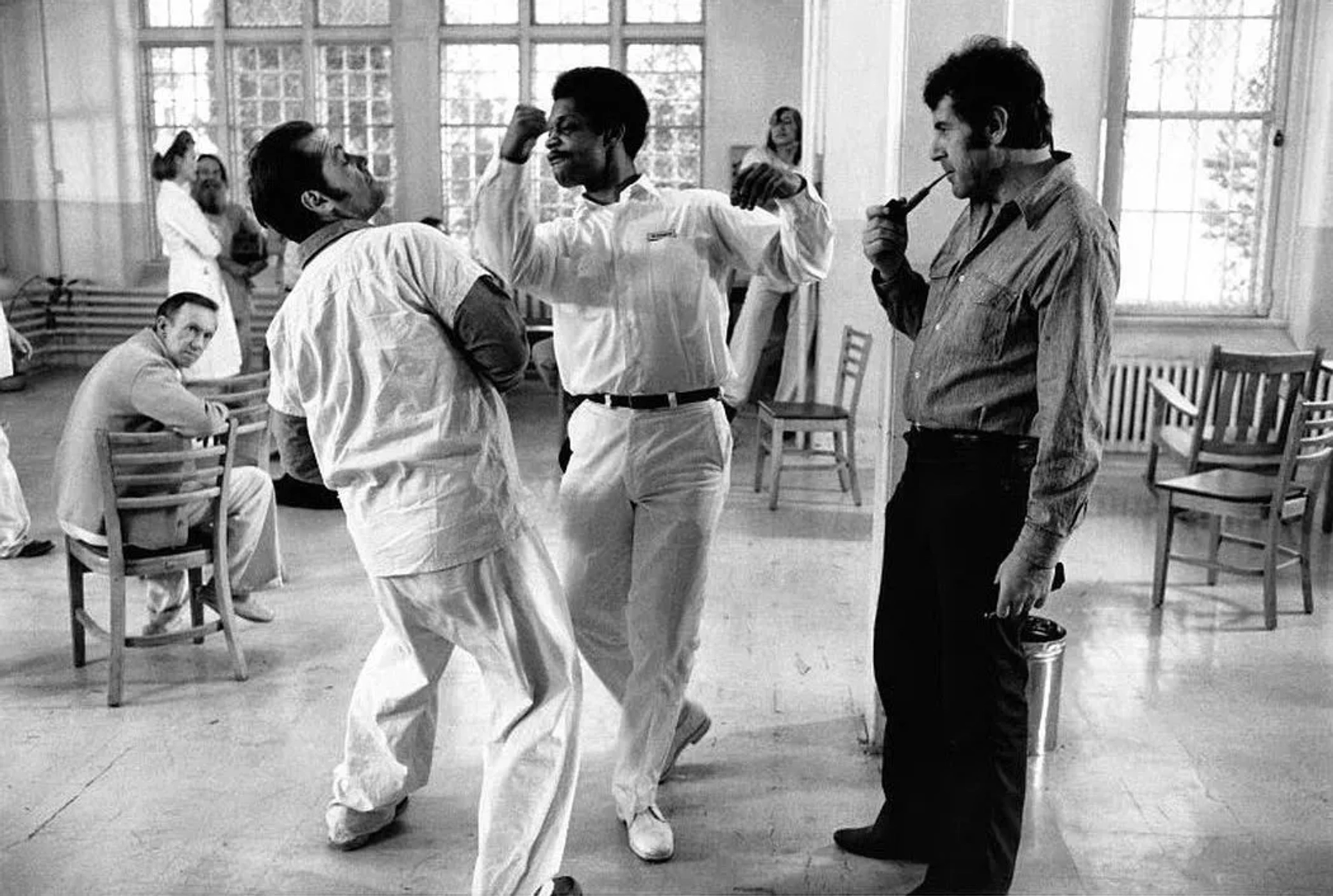 Jack Nicholson, Louise Fletcher, Milos Forman, William Duell, Nathan George, Will Sampson, and Delos V. Smith Jr. in One Flew Over the Cuckoo's Nest (1975)