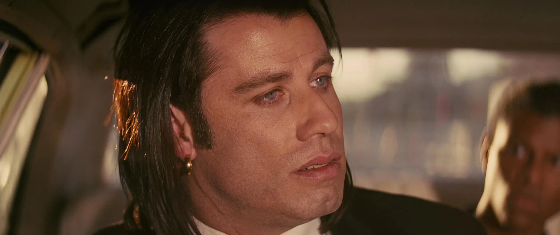 John Travolta and Phil LaMarr in Pulp Fiction (1994)