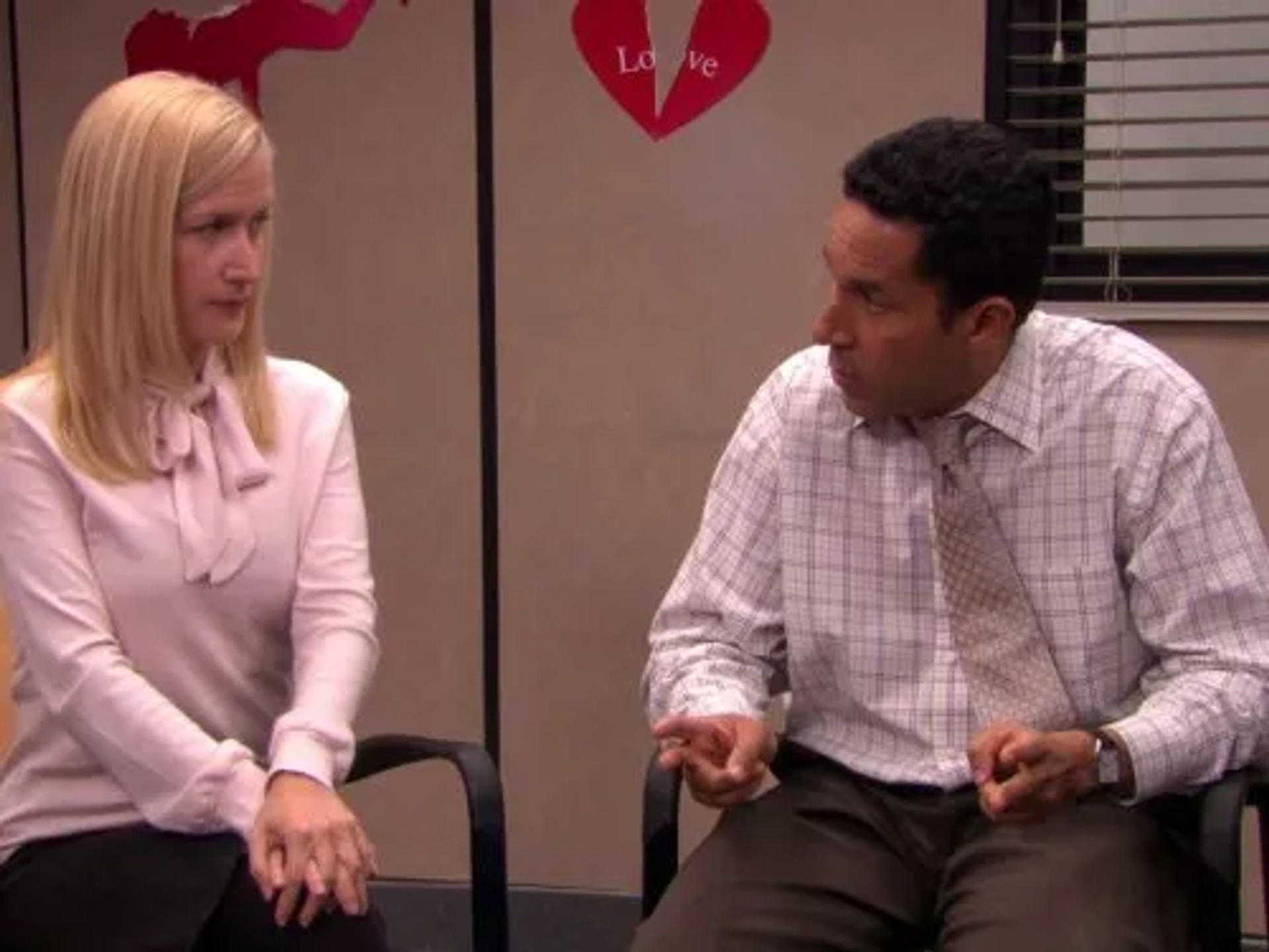 Oscar Nuñez and Angela Kinsey in The Office (2005)