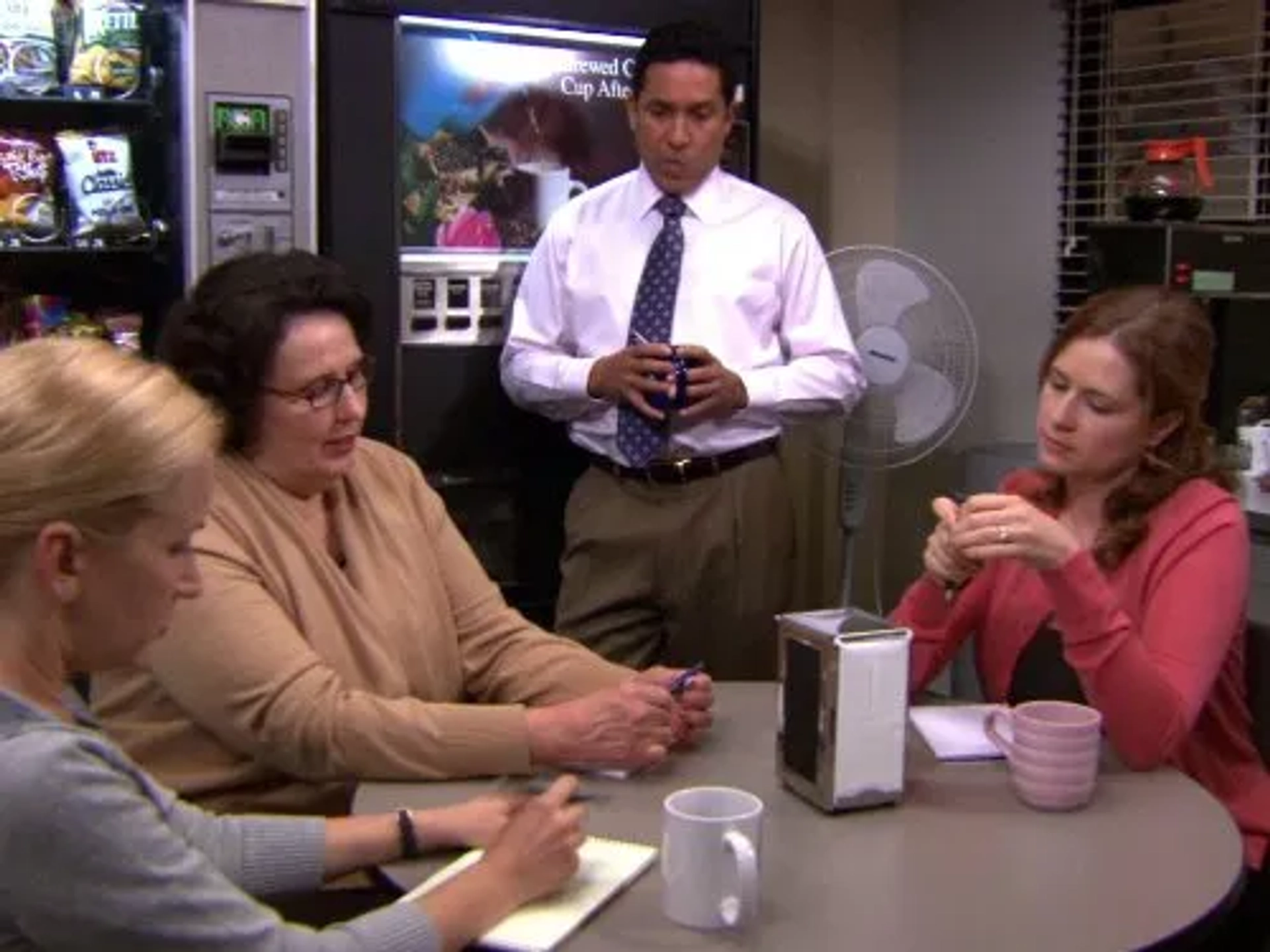 Jenna Fischer, Phyllis Smith, Oscar Nuñez, and Angela Kinsey in The Office (2005)