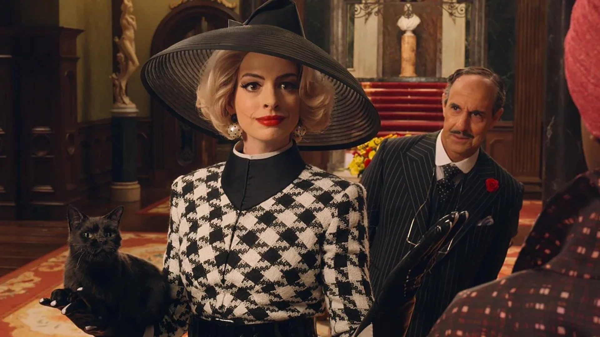Stanley Tucci and Anne Hathaway in The Witches (2020)