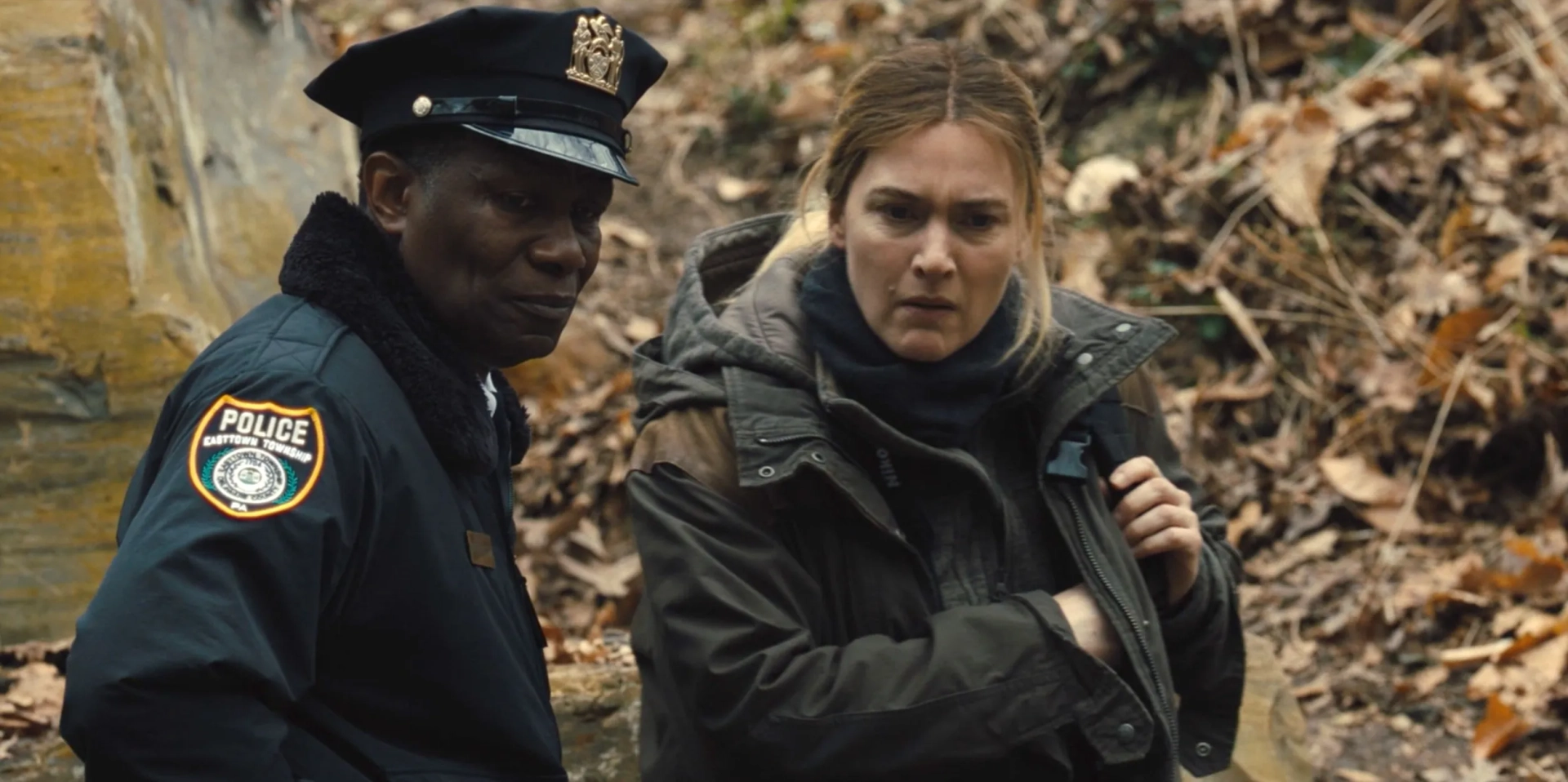 Kate Winslet and John Douglas Thompson in Mare of Easttown (2021)