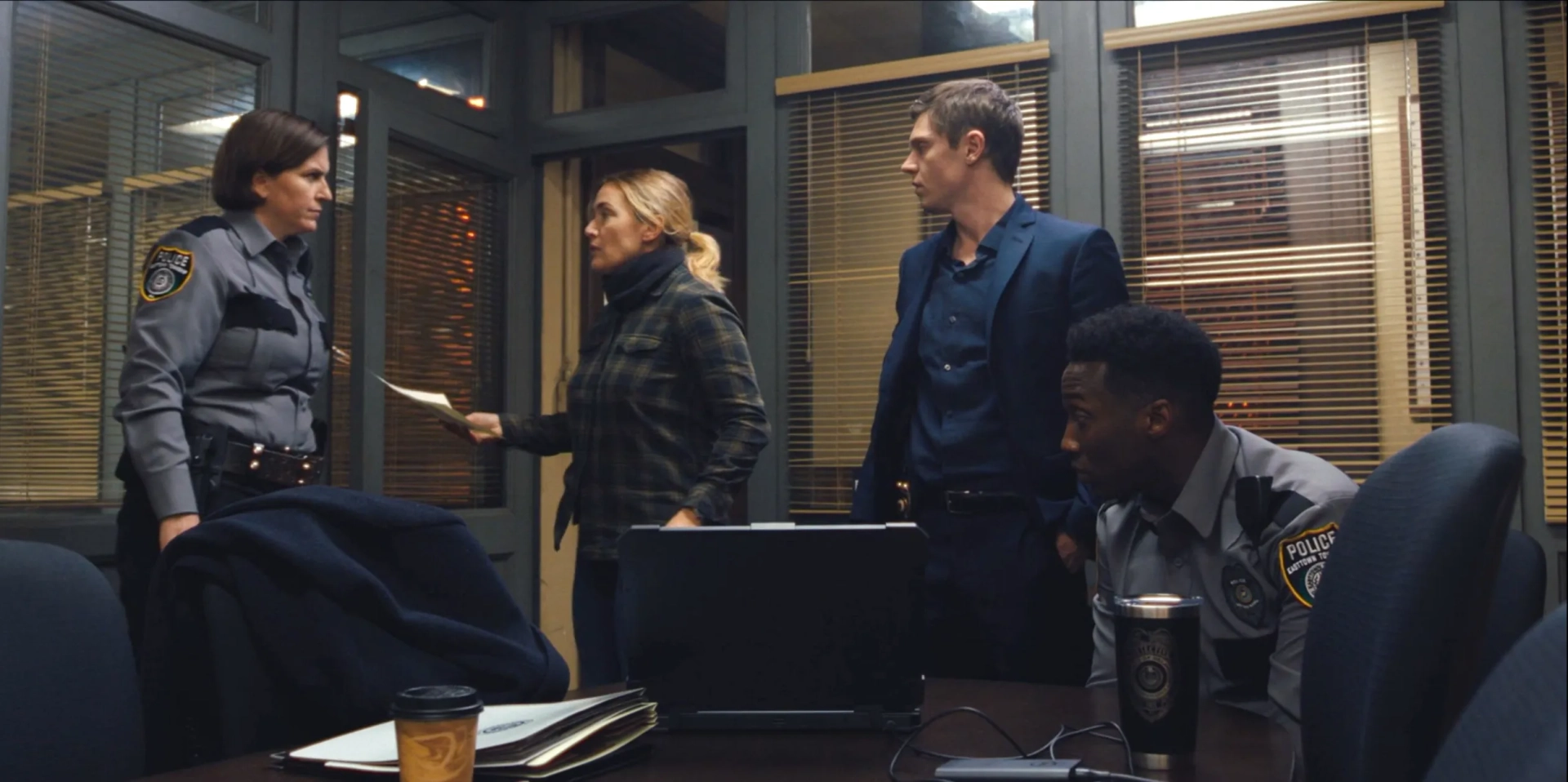 Kate Winslet, Kittson O'Neill, Evan Peters, and Justin Hurtt-Dunkley in Mare of Easttown (2021)