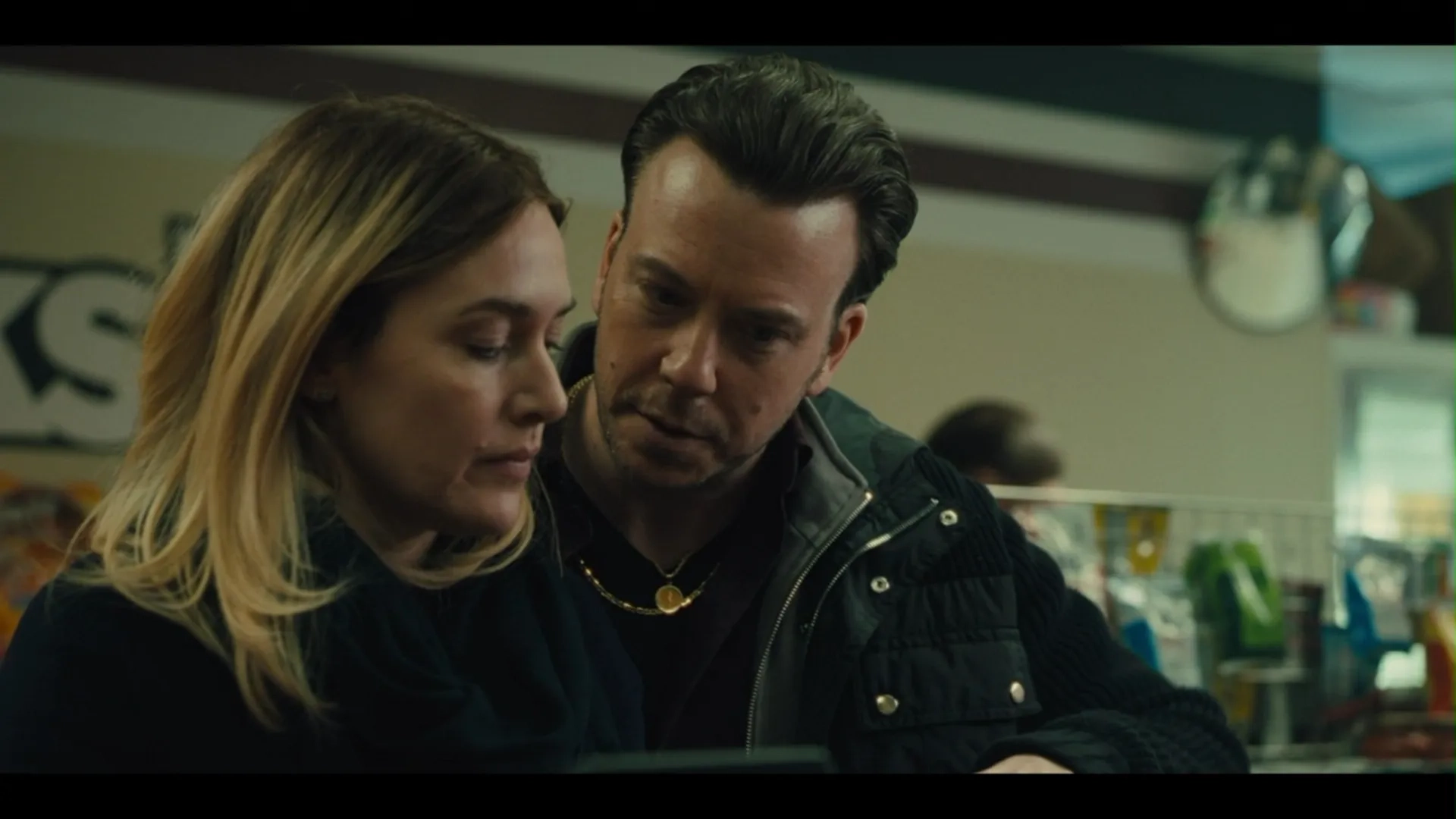 Kate Winslet and Eric T. Miller in Mare of Easttown (2021)