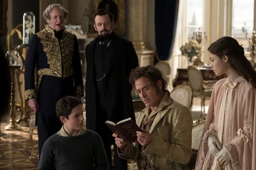 Robert Downey Jr., Jim Broadbent, Michael Sheen, Harry Collett, and Carmel Laniado in Dolittle (2020)