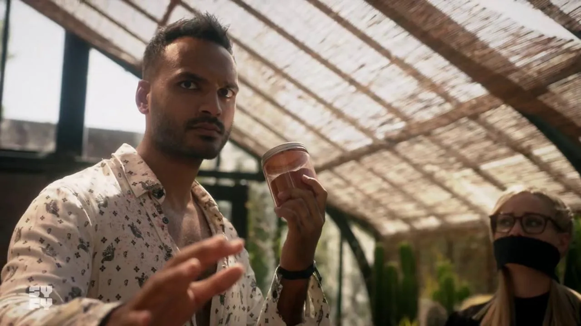 Olivia Taylor Dudley and Arjun Gupta in The Magicians: Acting Dean (2020)