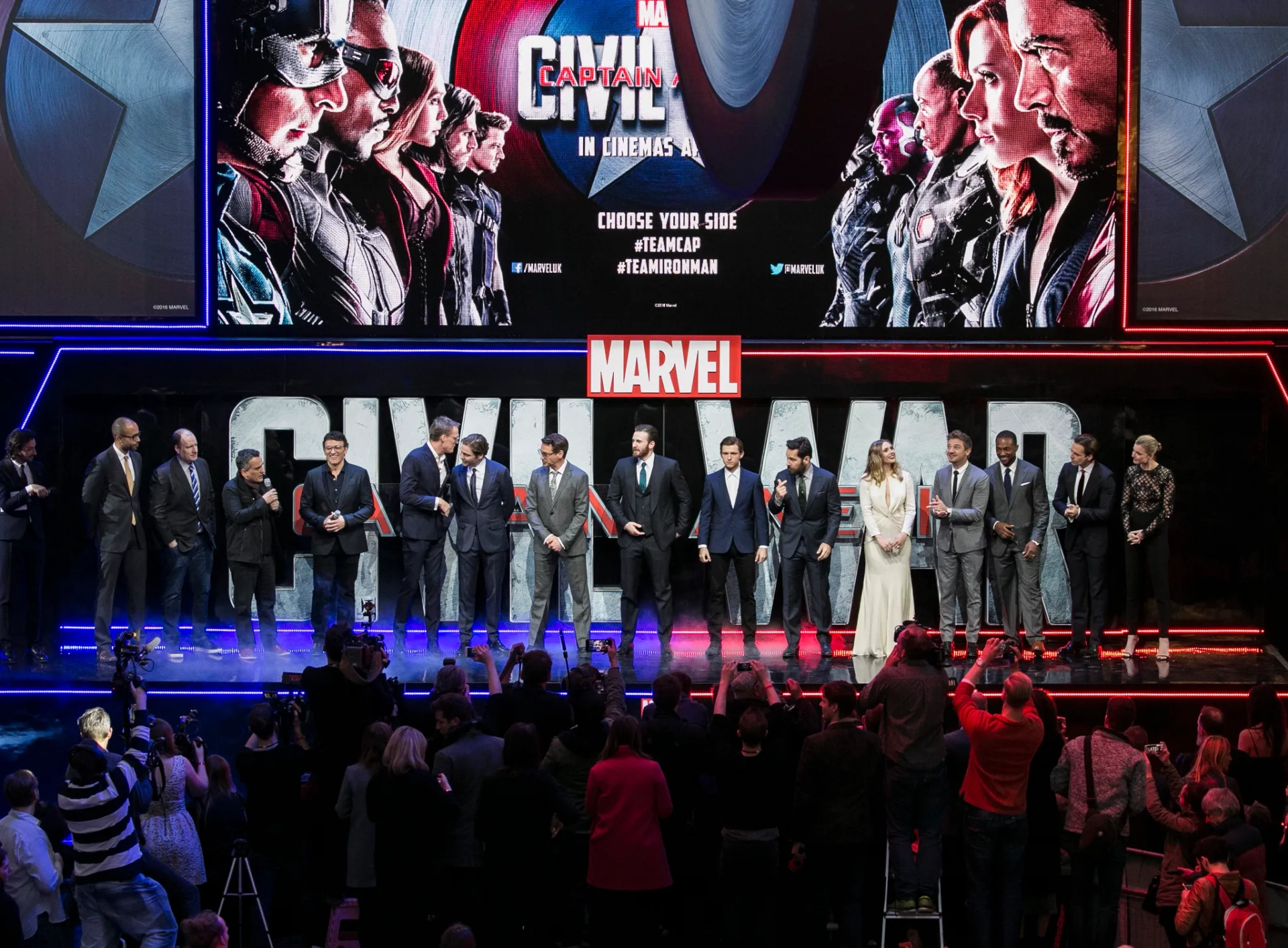 Don Cheadle, Robert Downey Jr., Paul Bettany, Daniel Brühl, Chris Evans, Kevin Feige, Scarlett Johansson, Elizabeth Olsen, Jeremy Renner, Paul Rudd, Anthony Russo, Joe Russo, Emily VanCamp, Anthony Mackie, Chadwick Boseman, Sebastian Stan, and Tom Holland at an event for Captain America: Civil War (2016)