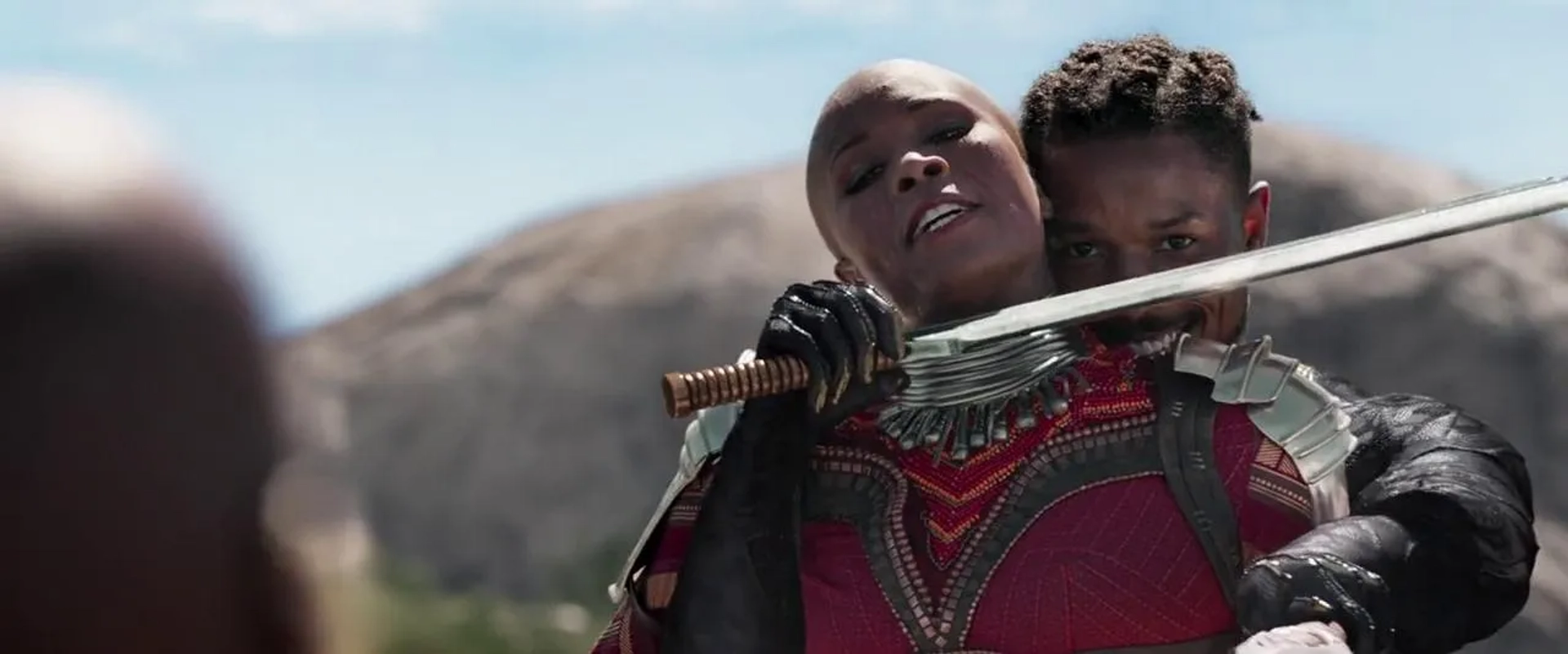 Michael B. Jordan and Florence Kasumba in Black Panther (2018)