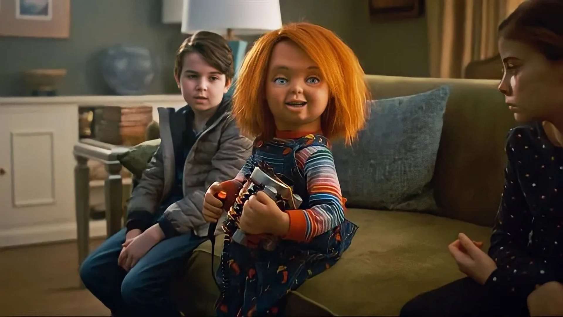 Brad Dourif, Simon Webster, and Carina Battrick in Chucky: Halloween II (2022)