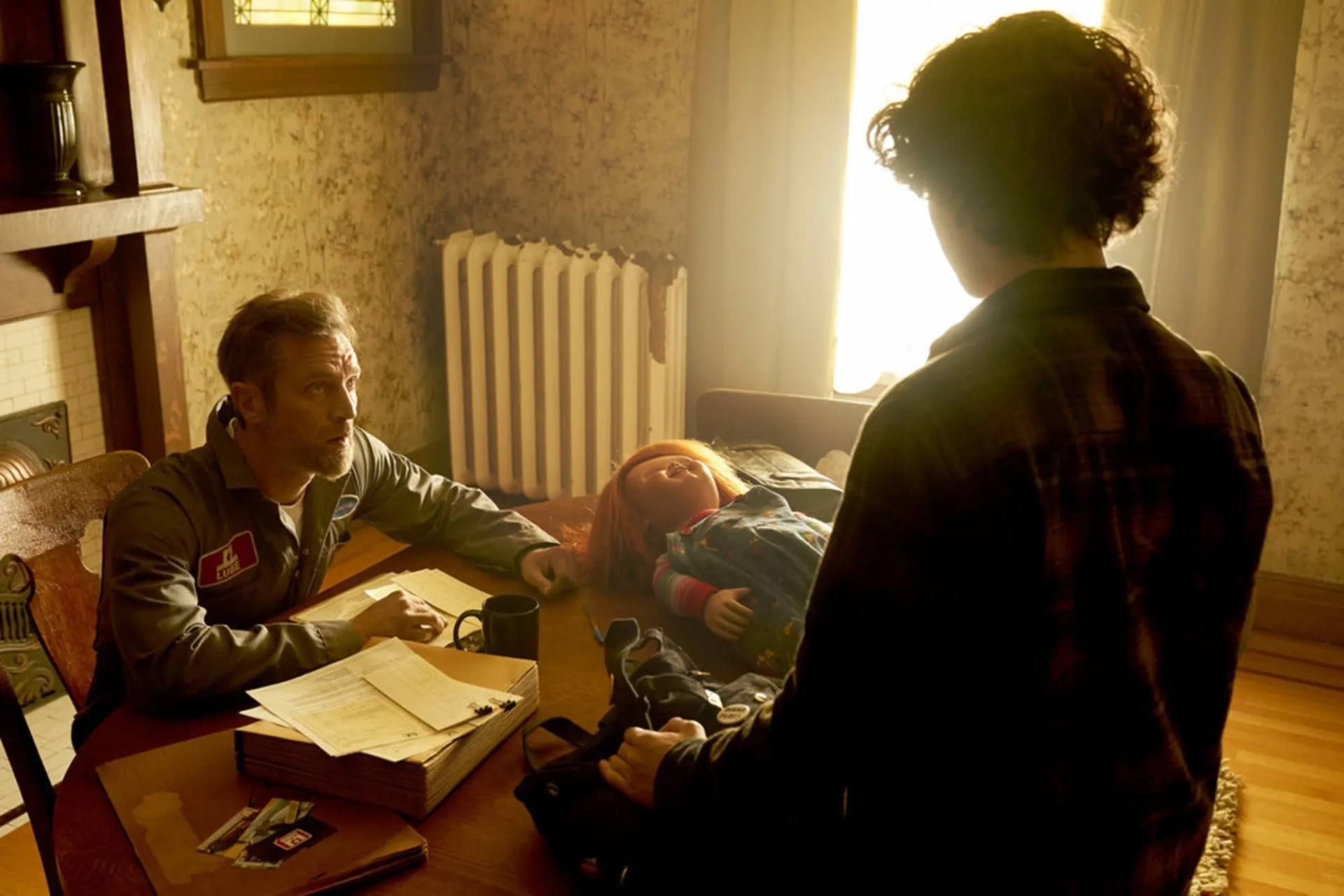 Brad Dourif, Devon Sawa, and Zackary Arthur in Chucky (2021)