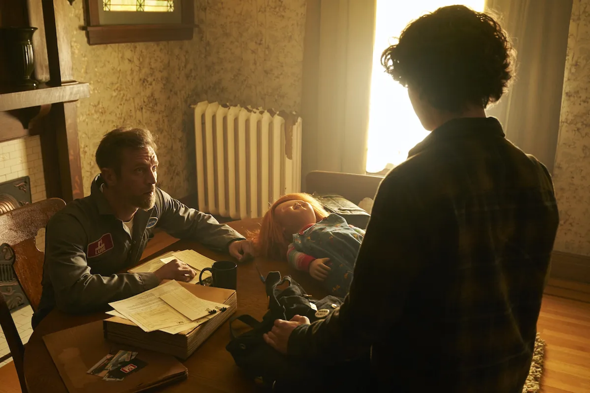 Brad Dourif, Devon Sawa, and Zackary Arthur in Chucky (2021)