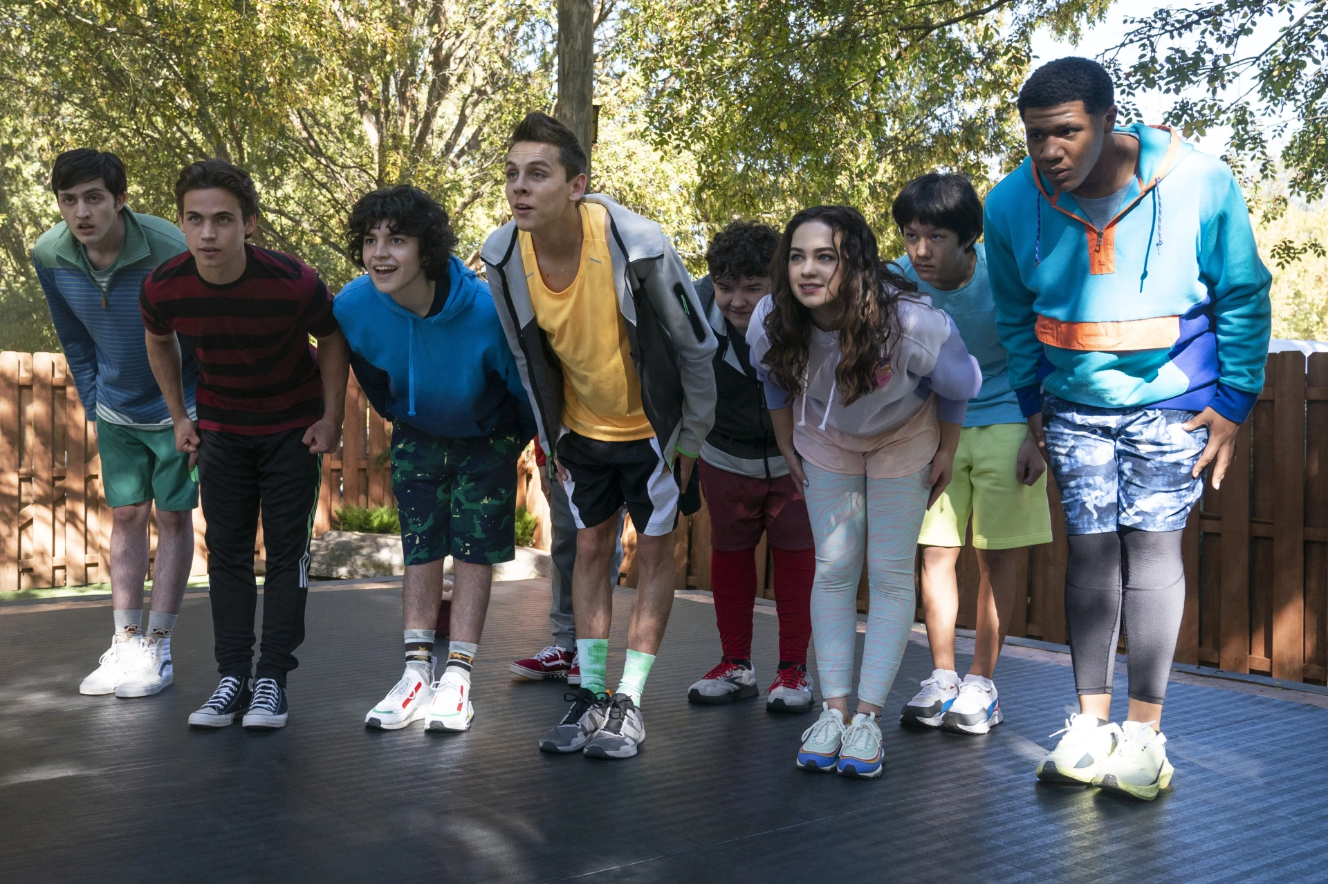 Mary Mouser, Jacob Bertrand, and Tanner Buchanan in Cobra Kai: Bad Eggs (2022)