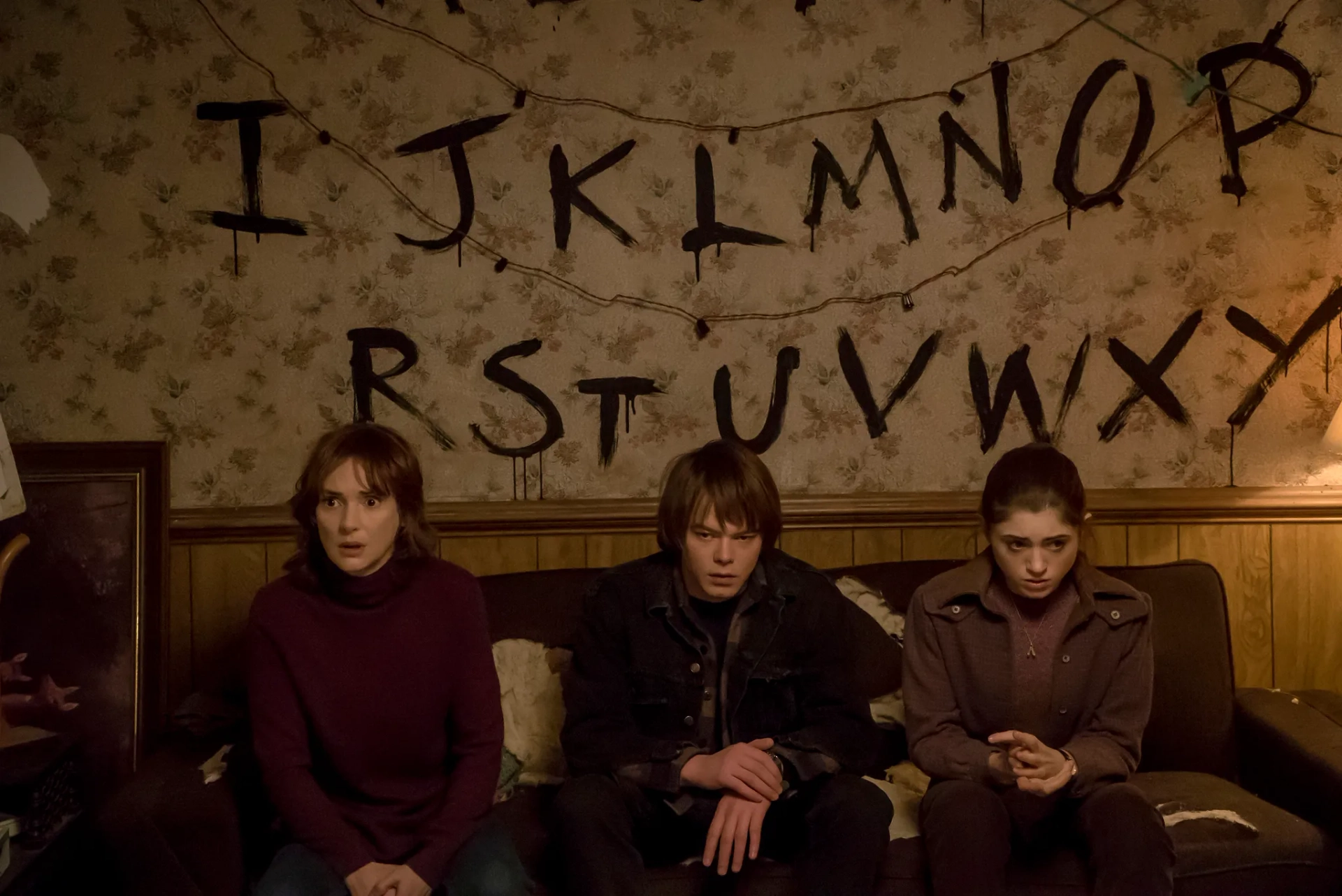 Winona Ryder, Natalia Dyer, and Charlie Heaton in Stranger Things (2016)