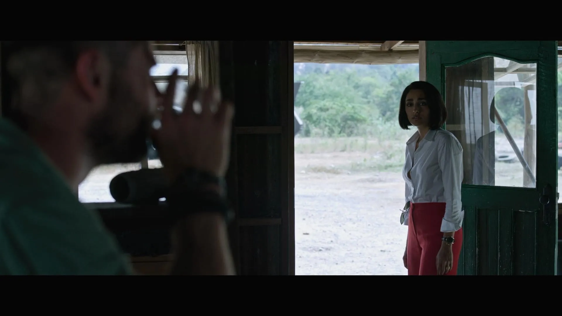 Golshifteh Farahani and Chris Hemsworth in Extraction (2020)