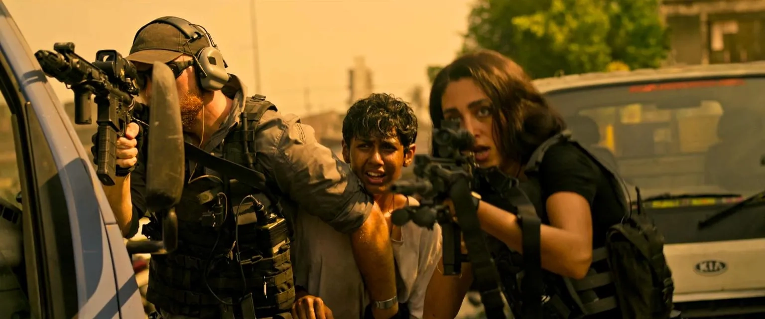 Golshifteh Farahani and Rudhraksh Jaiswal in Extraction (2020)