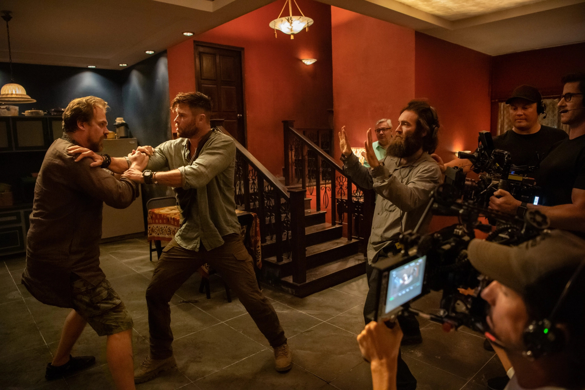 David Harbour, Sam Hargrave, and Chris Hemsworth in Extraction (2020)