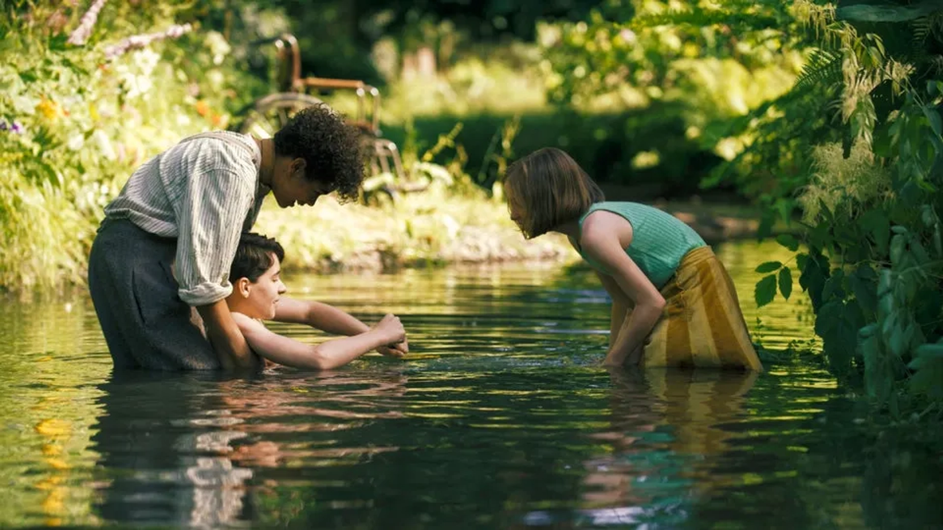 Dixie Egerickx, Edan Hayhurst, and Amir Wilson in The Secret Garden (2020)